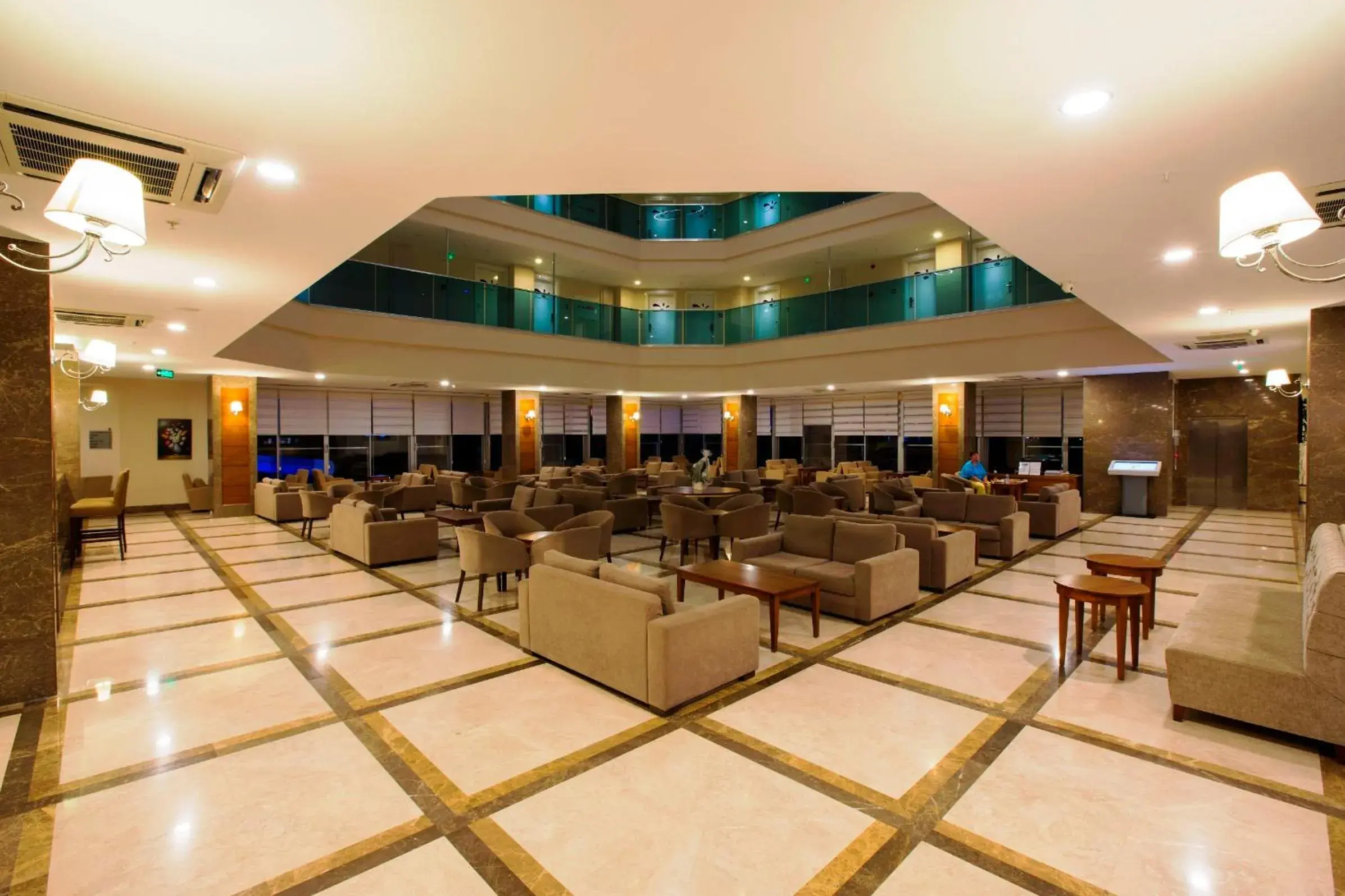 Lobby or reception, Lounge/Bar in Ramada Resort Side