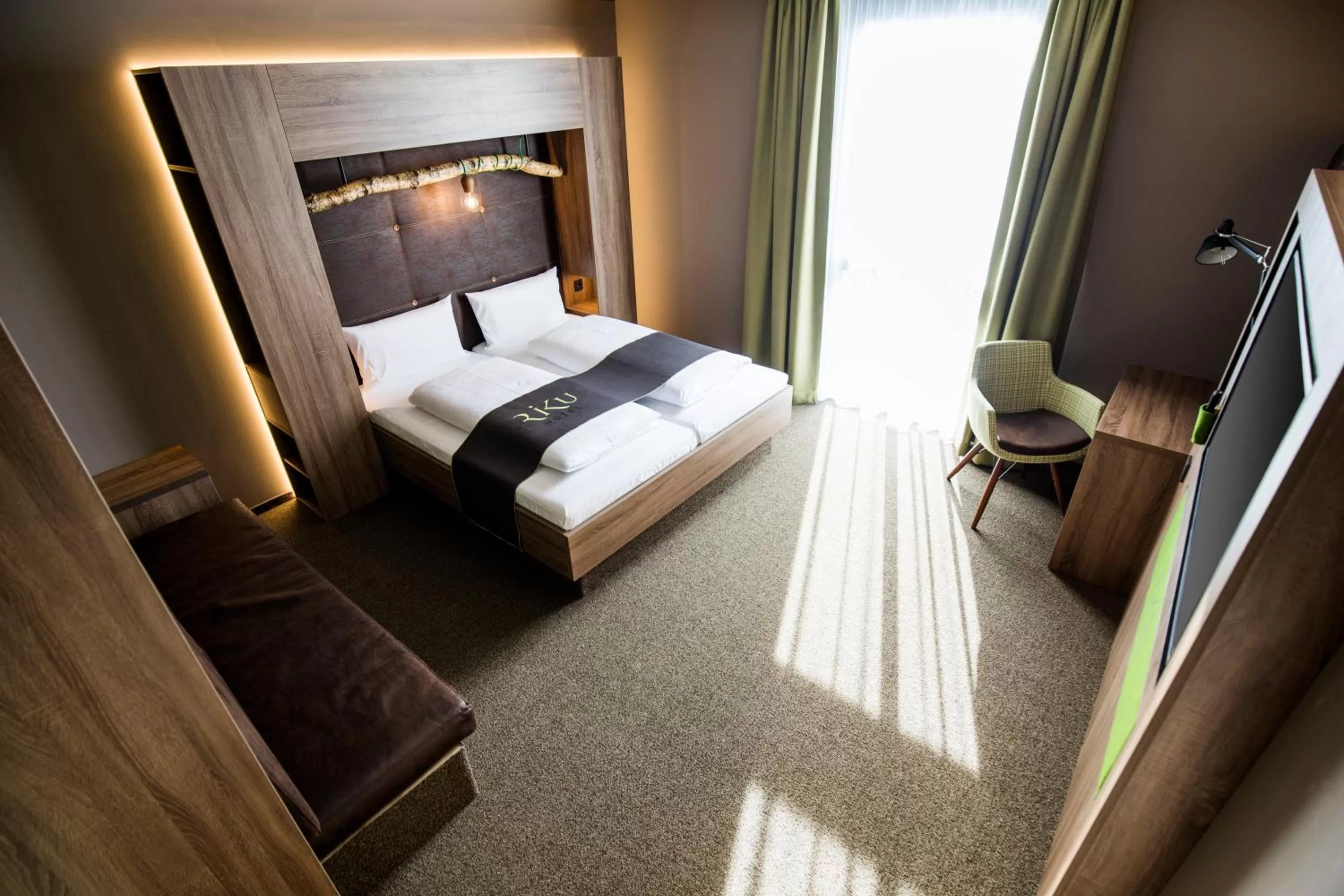 Photo of the whole room, Bed in RiKu HOTEL Pfullendorf