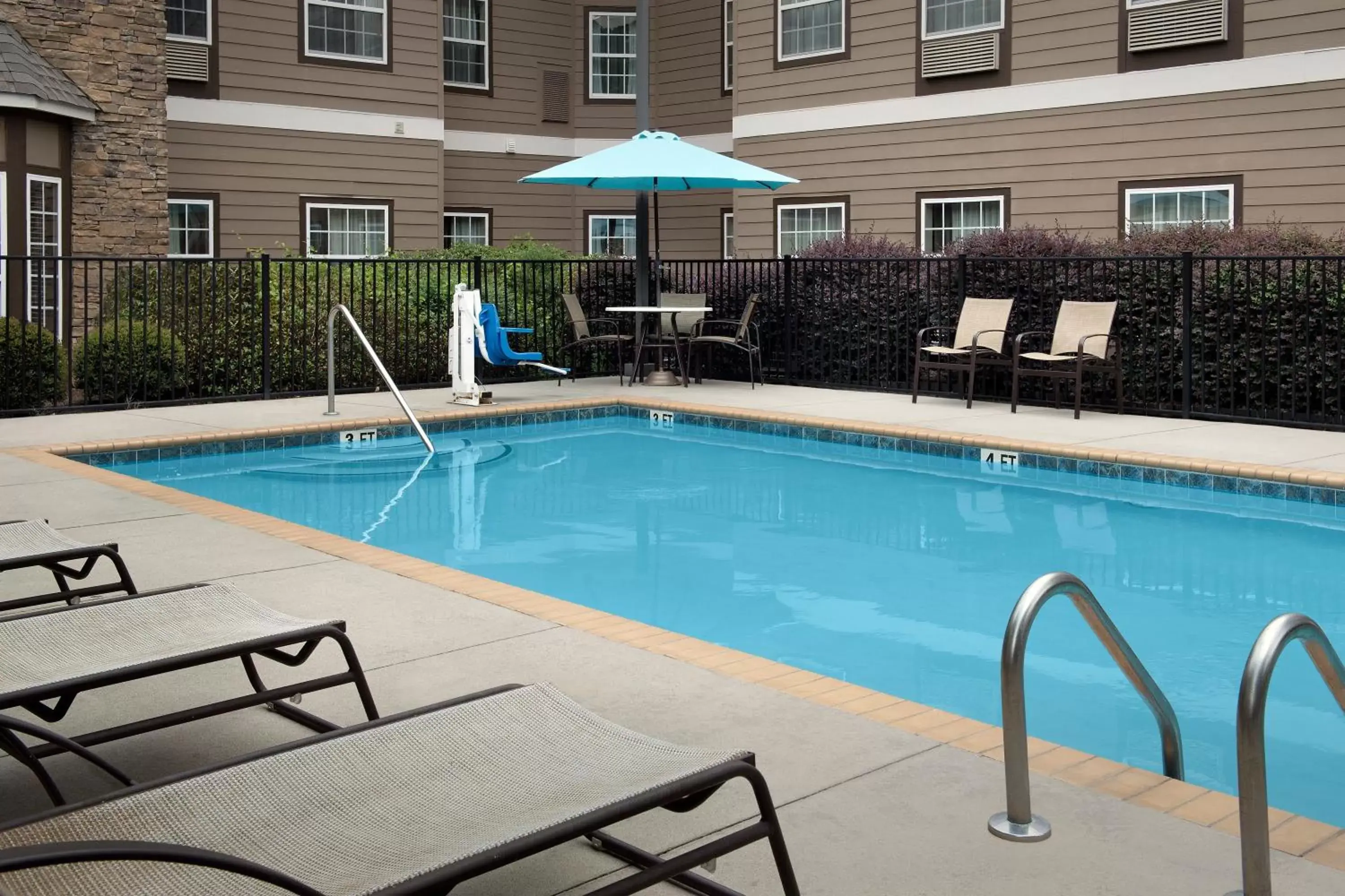 Swimming Pool in Staybridge Suites Greenville I-85 Woodruff Road, an IHG Hotel