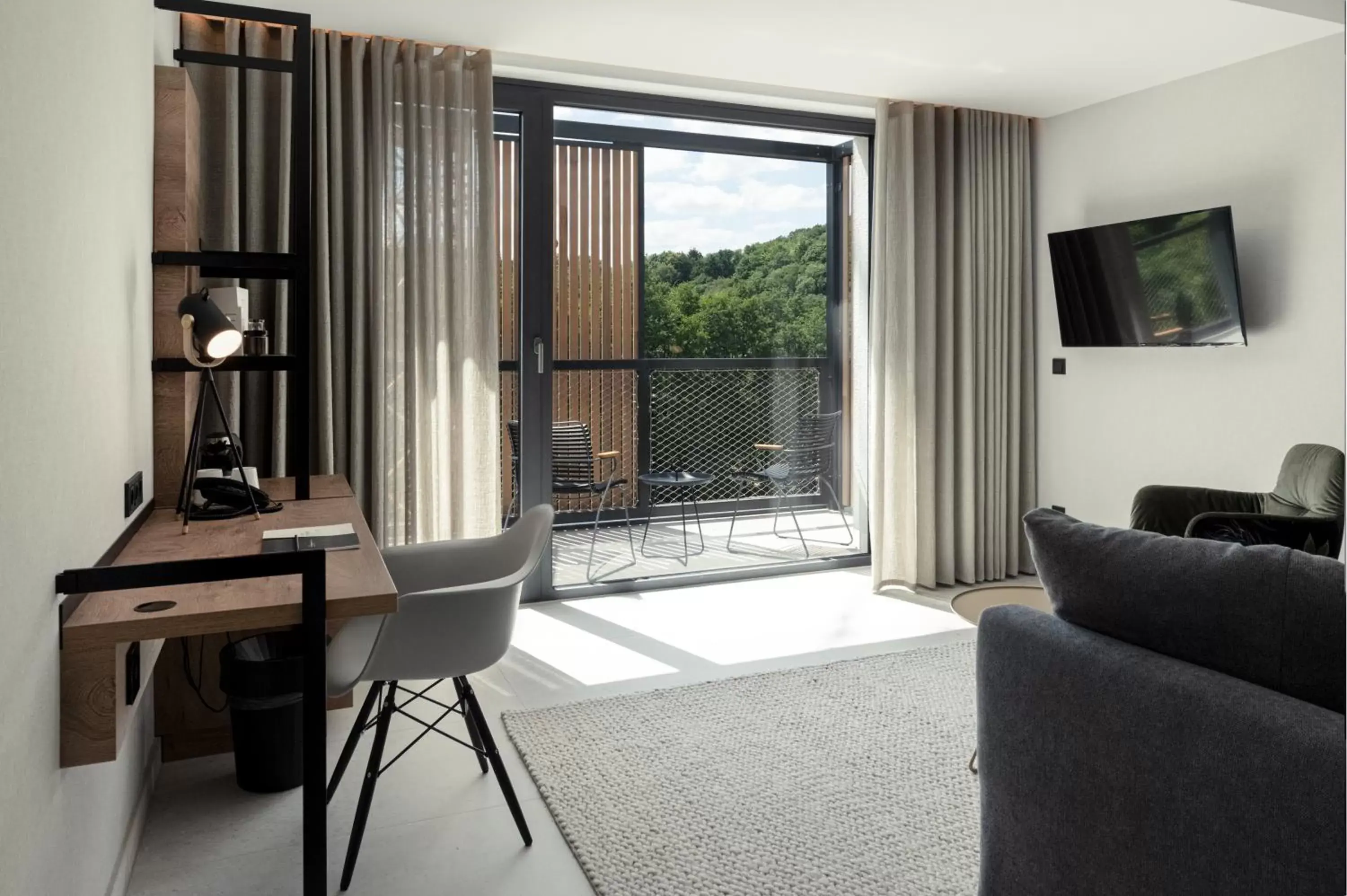 TV and multimedia, Seating Area in Hotel VierJahreszeiten am Seilersee