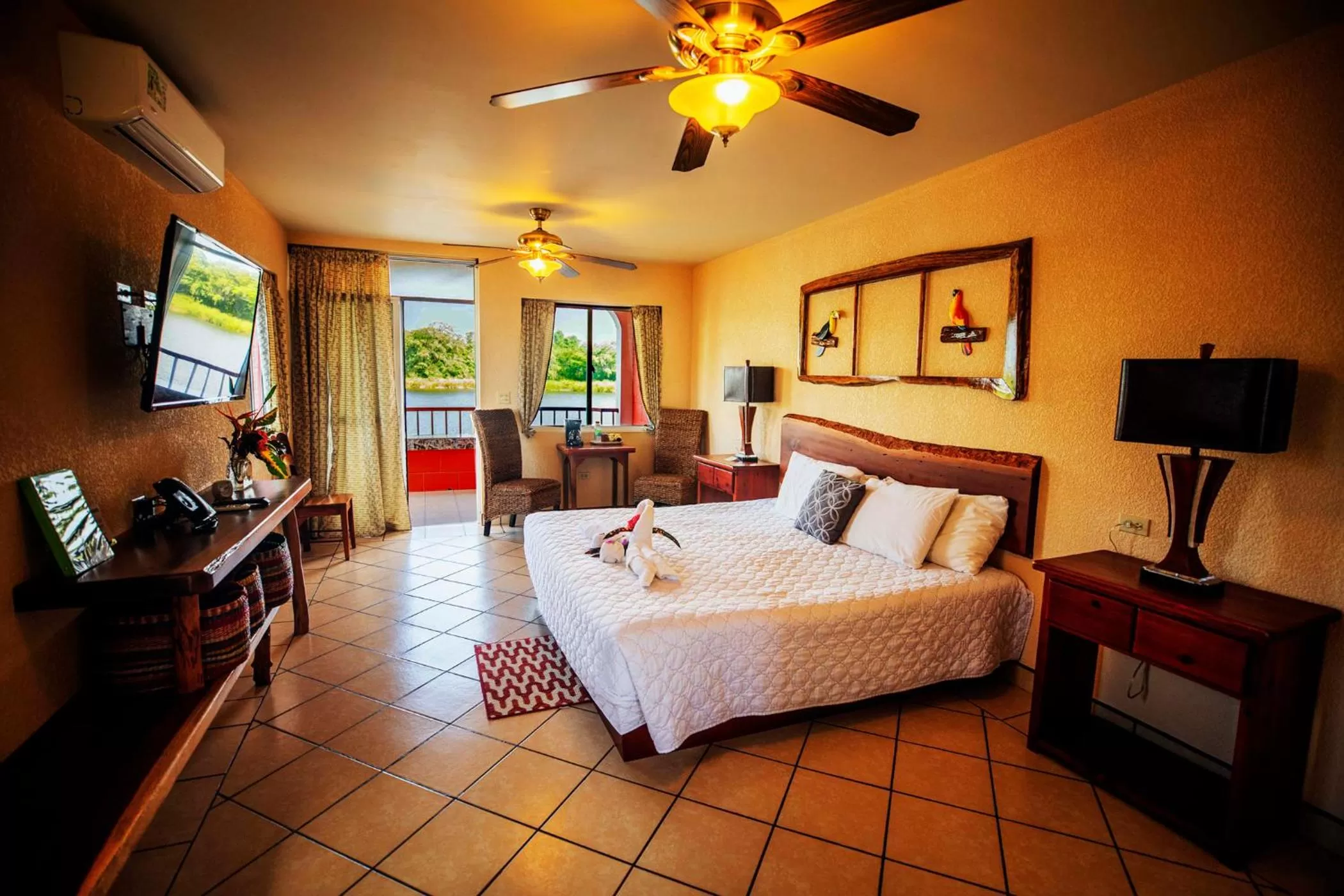 Bed in Lamanai Hotel & Marina