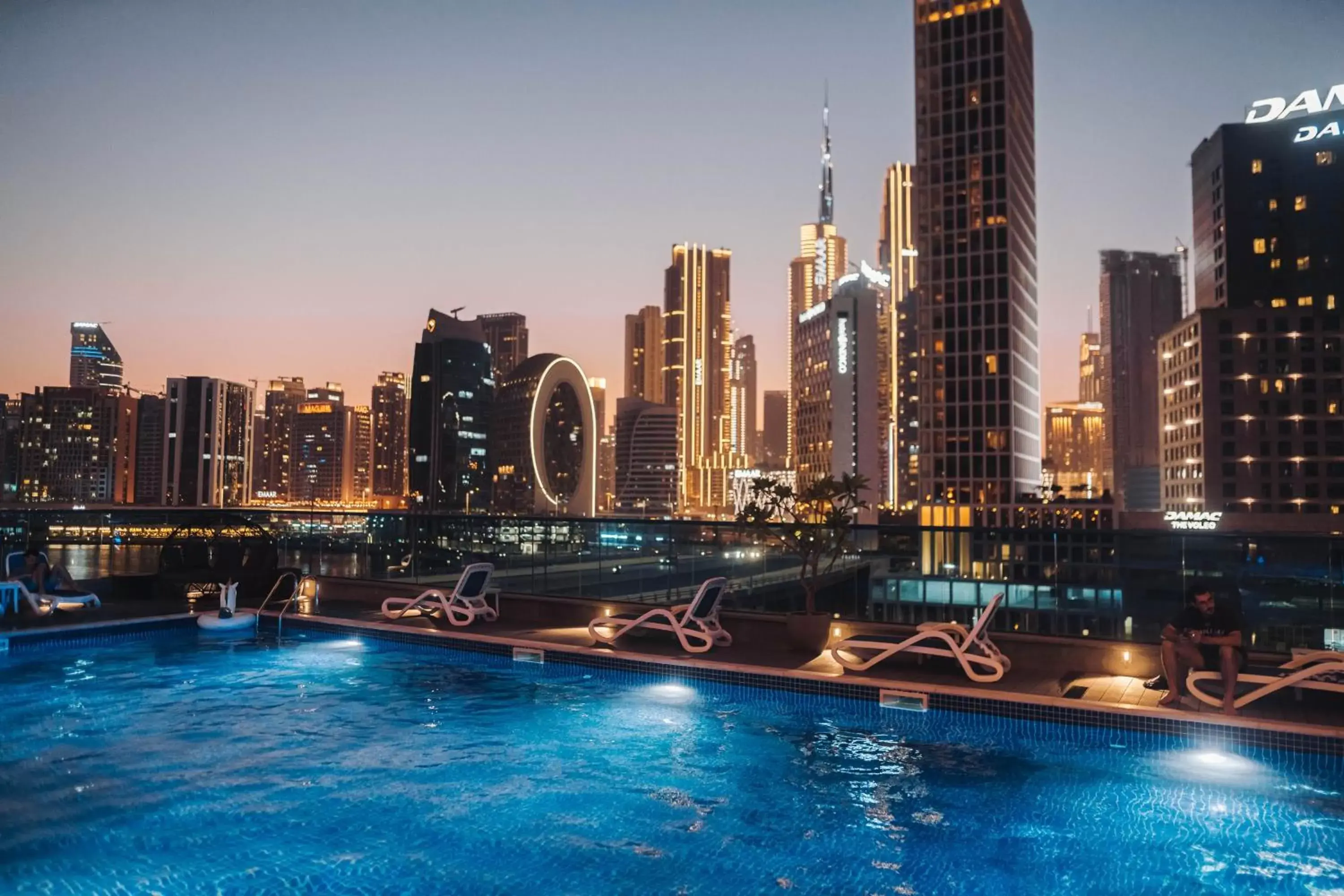 City view, Swimming Pool in Radisson Blu Hotel, Dubai Canal View