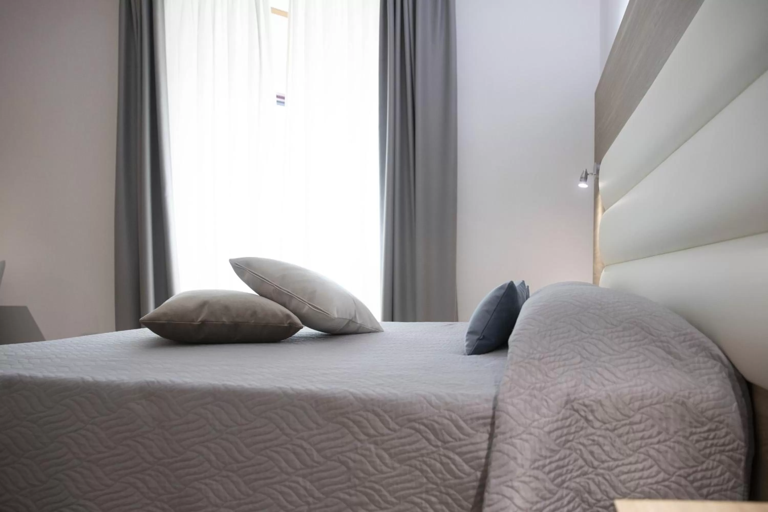 Bed in Pegasus Hotel