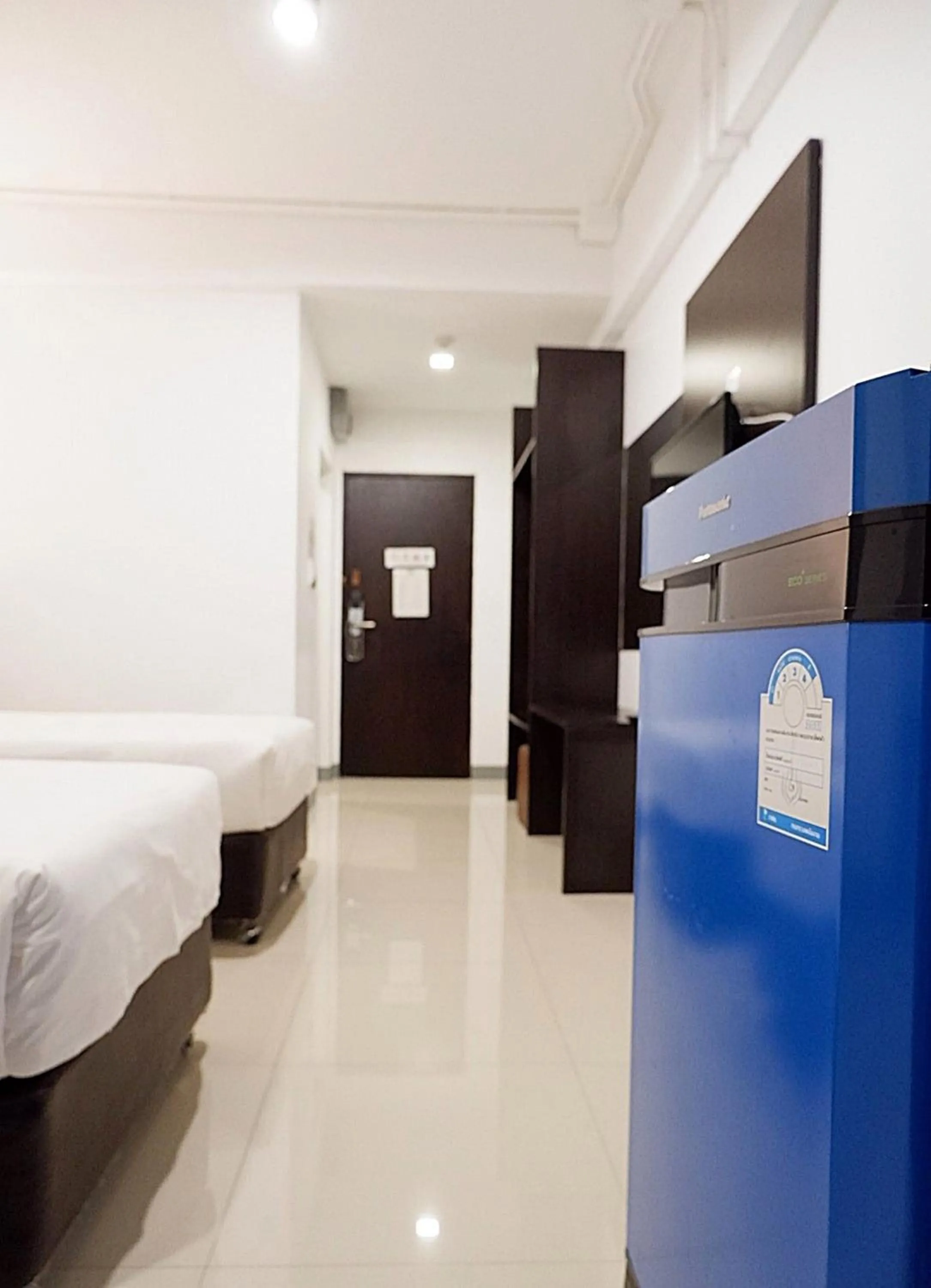 Bed in Izen Budget Hotel & Residence
