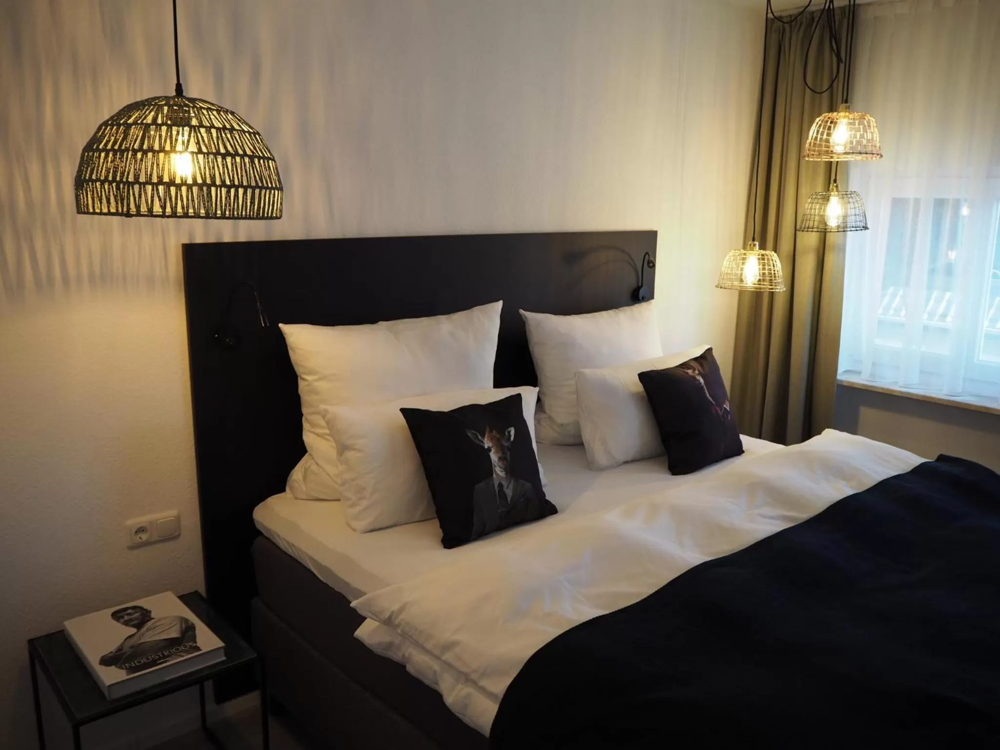 Bed in ONNO Boutique Hotel & Apartments