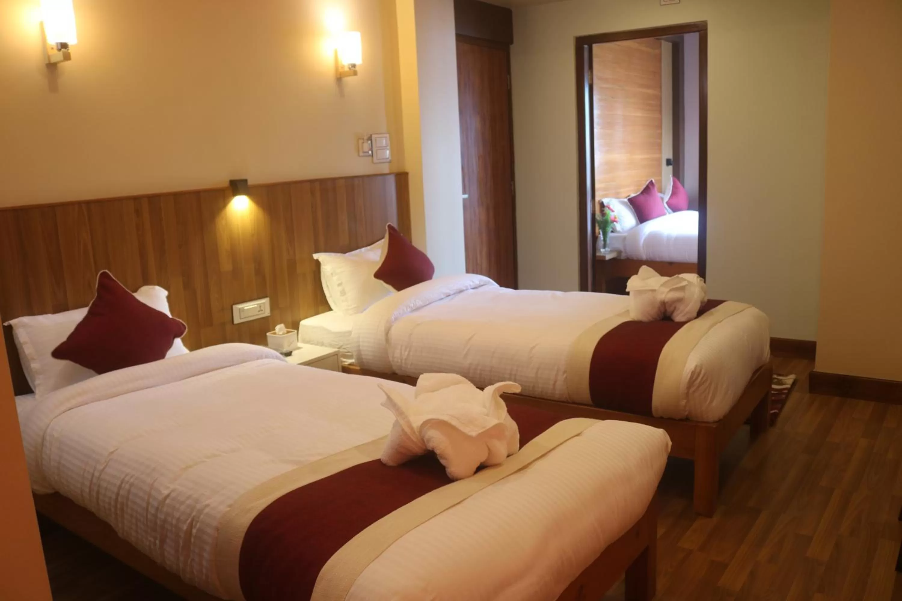 Bedroom, Bed in Hotel Family Ties Pvt. Ltd.