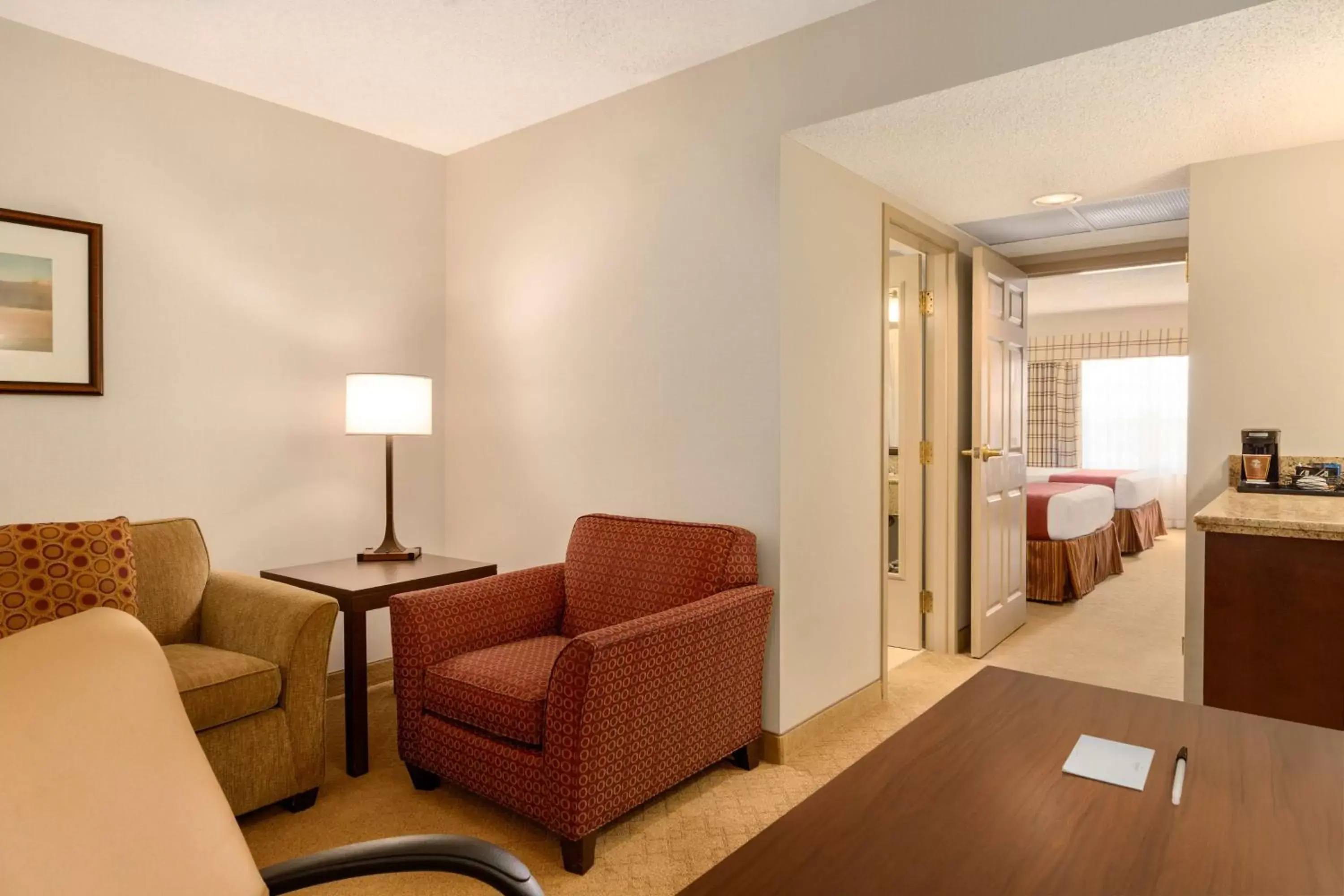 Photo of the whole room, Seating Area in Country Inn & Suites by Radisson, Calgary-Northeast