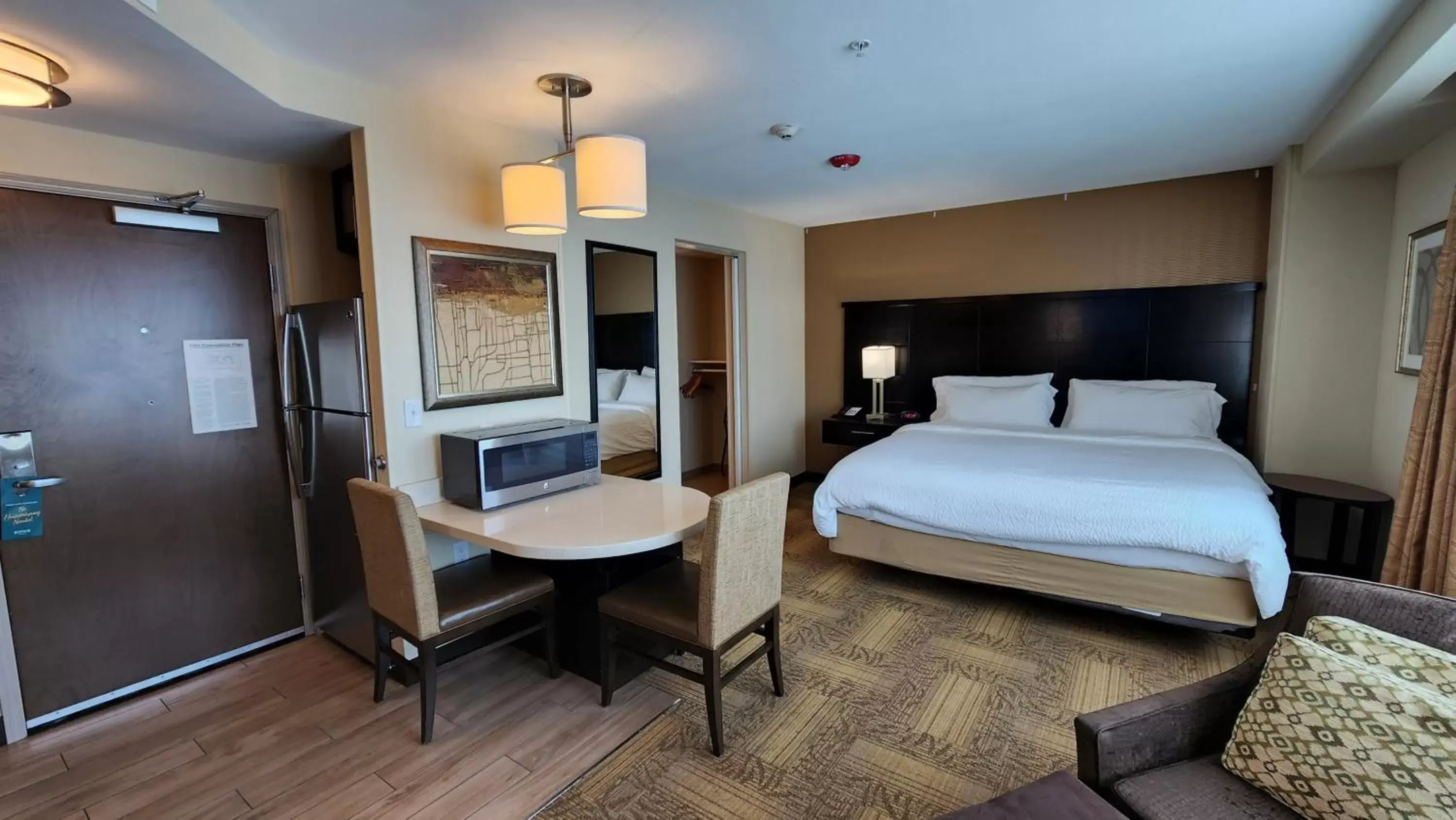 Photo of the whole room, Bed in Staybridge Suites Denver Downtown, an IHG Hotel