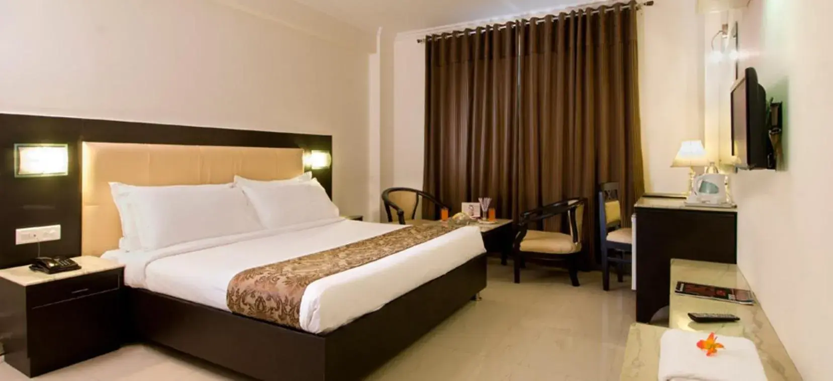 Bed in Hotel Pushpvilla