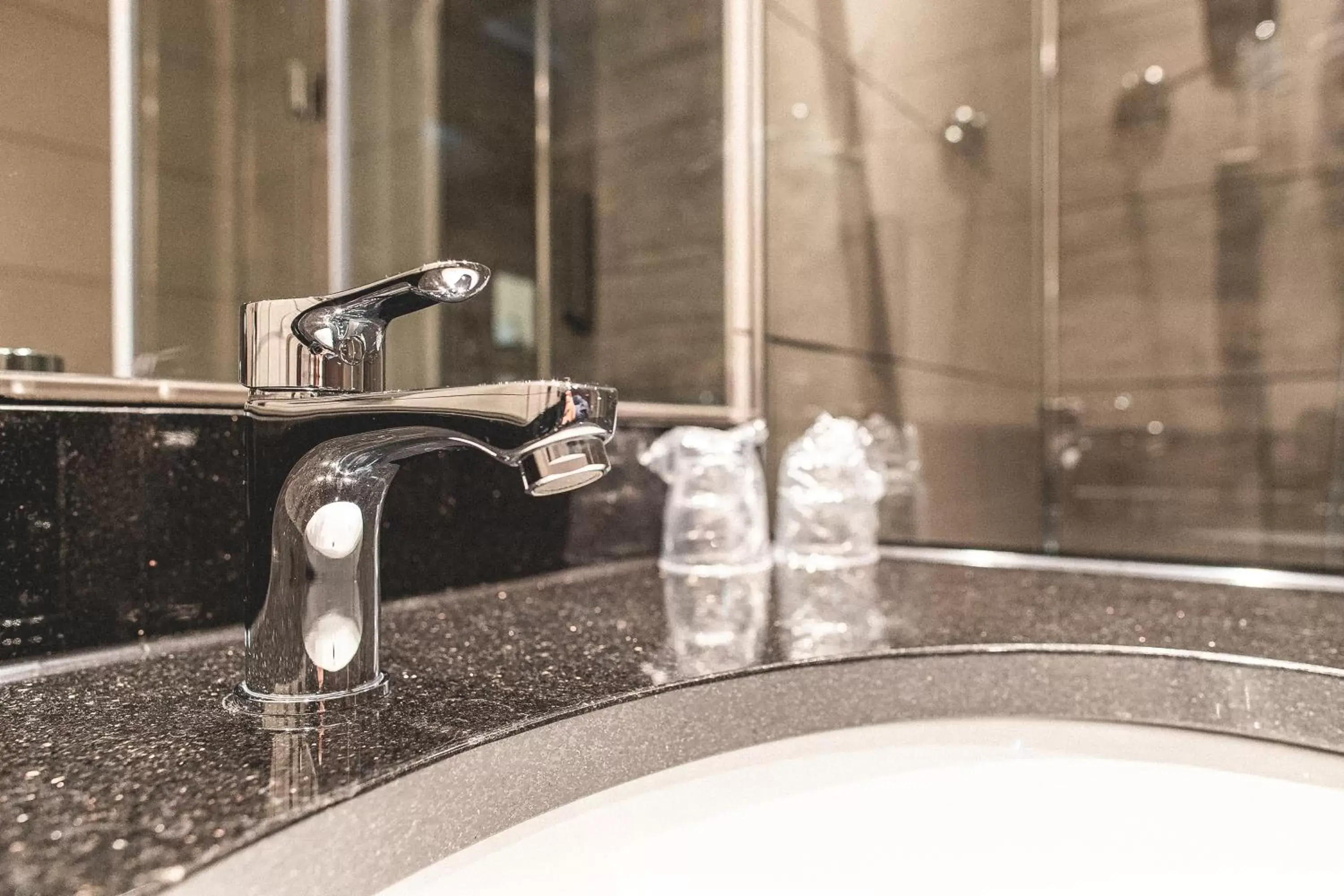 Bathroom in PLAZA Premium Parkhotel Norderstedt