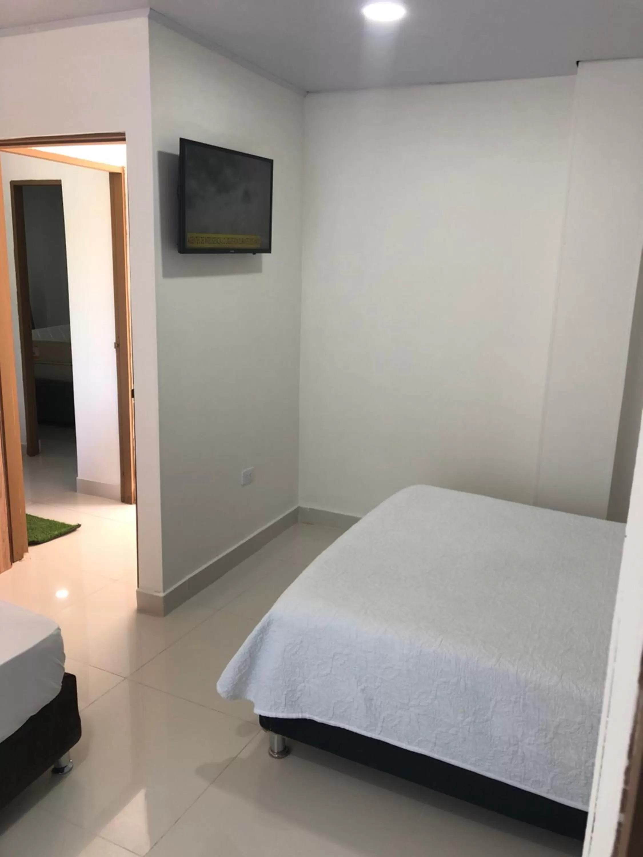 Bed in Apartamentos Isla Tropical