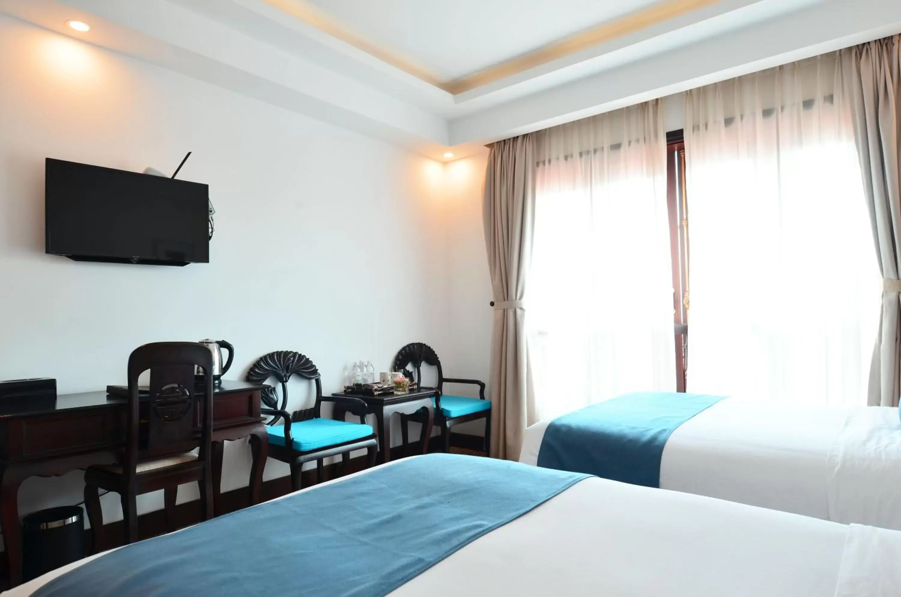 Bedroom, TV/Entertainment Center in Hoian Central Hotel