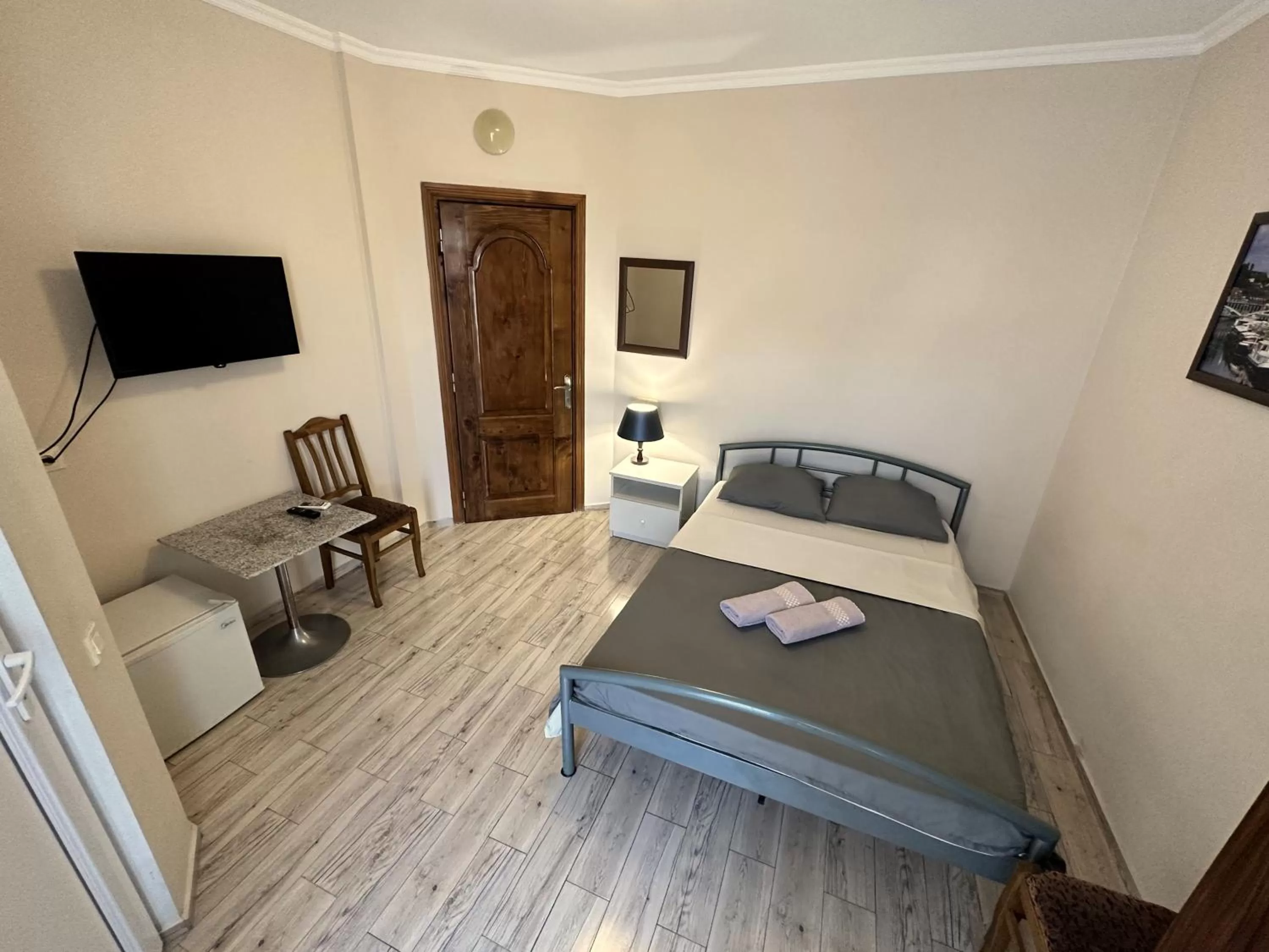 Photo of the whole room, Bed in National+