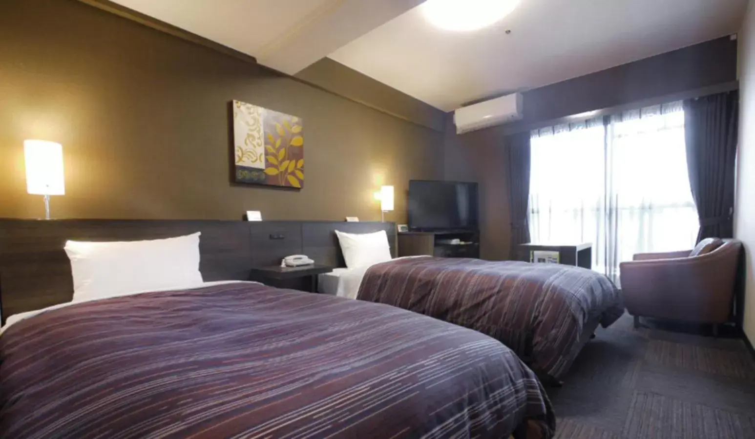 Photo of the whole room, Bed in Hotel Route-Inn Kumamoto Ekimae