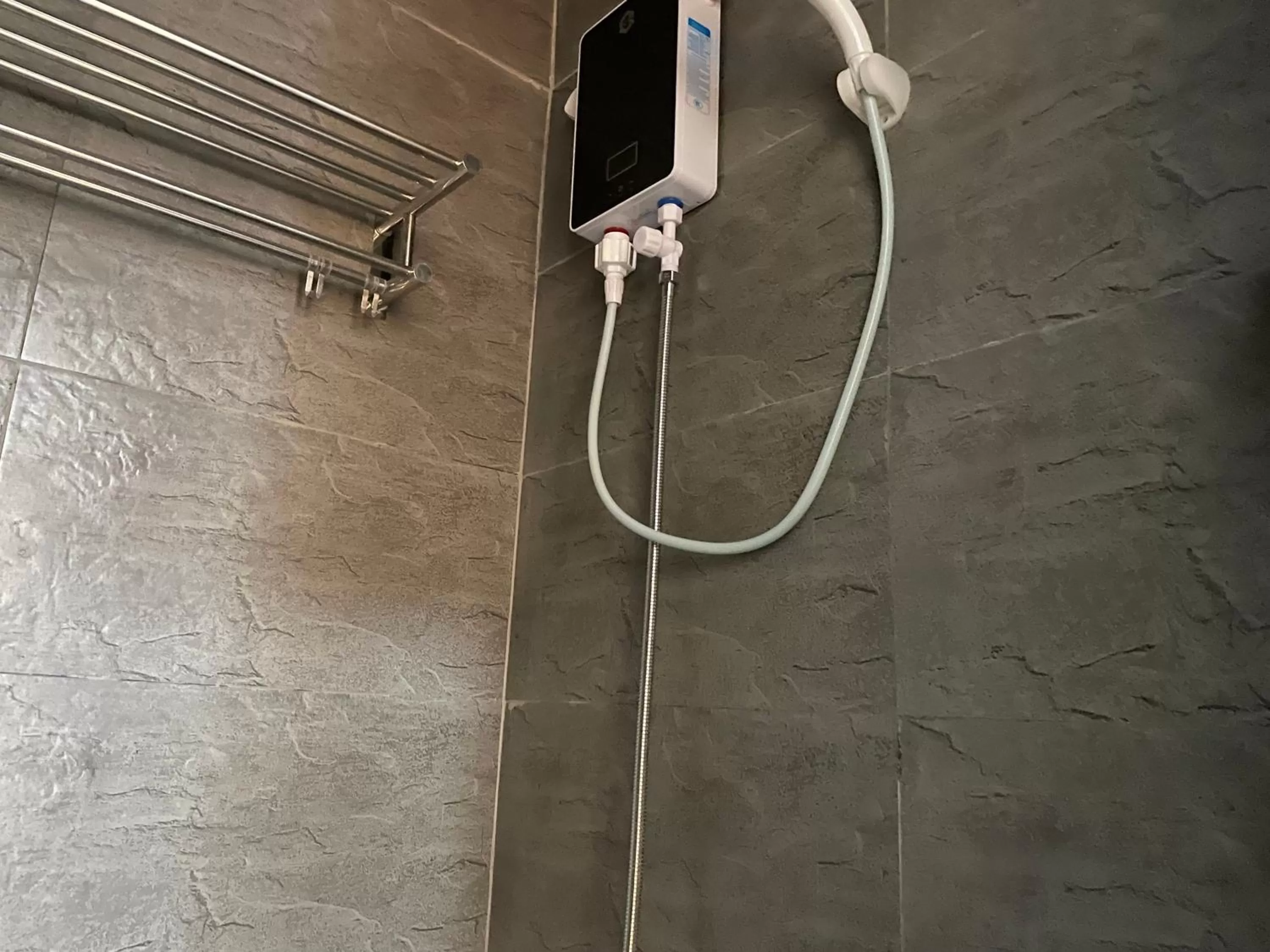Shower in Rangya Hotel