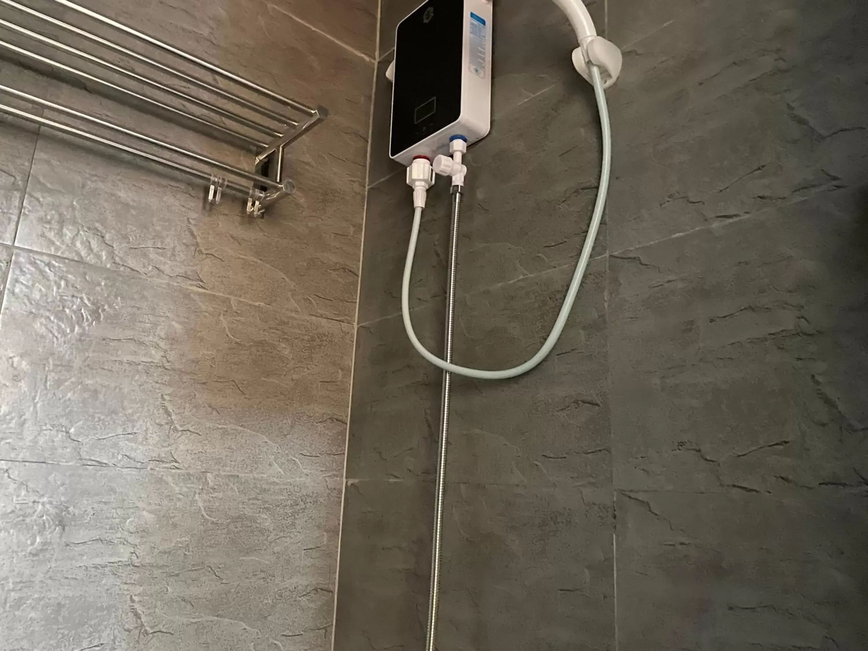 Shower, Bathroom in Rangya Hotel