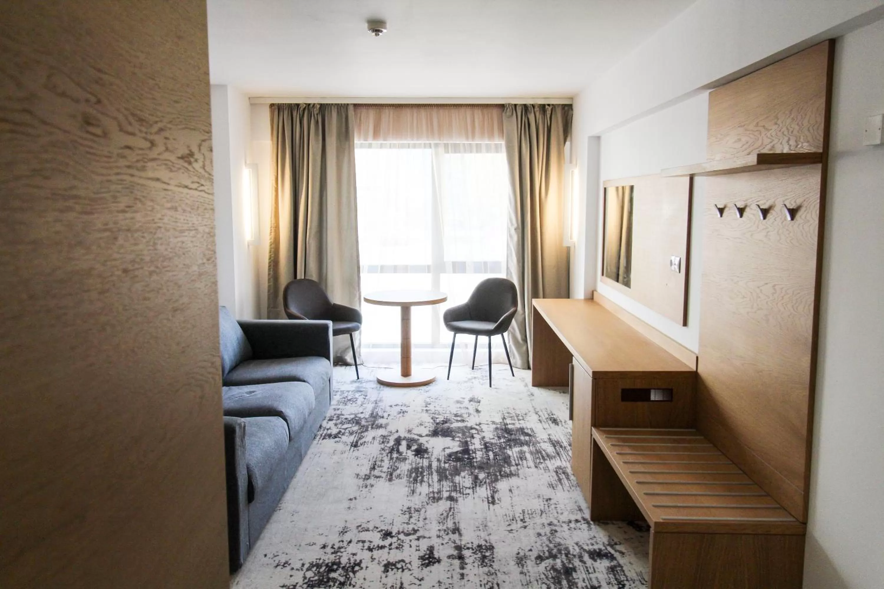 Seating area in Hotel Avenue - Avenue Hotels