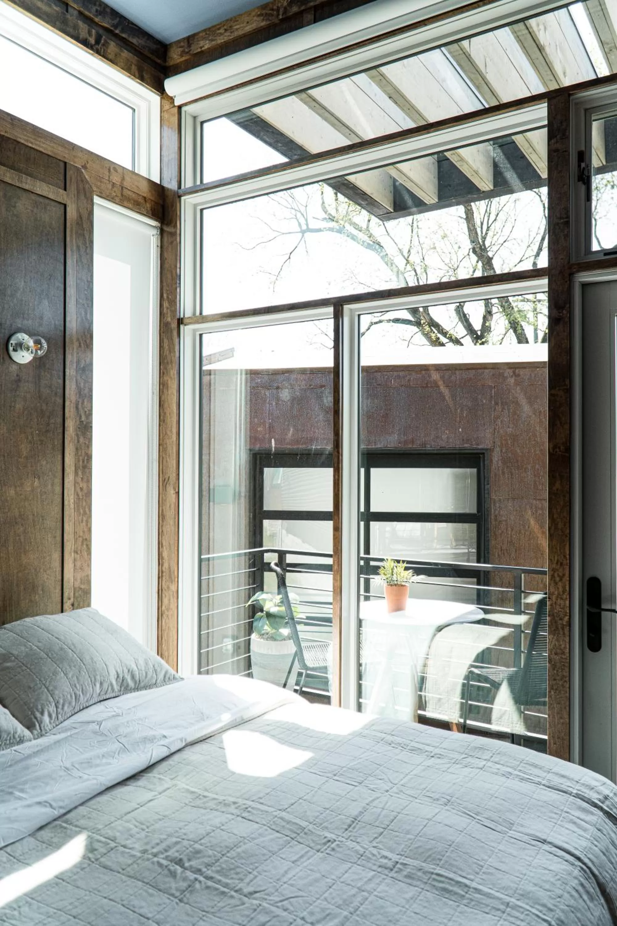 Bed in Ironwood Grove, Tiny House Hotel