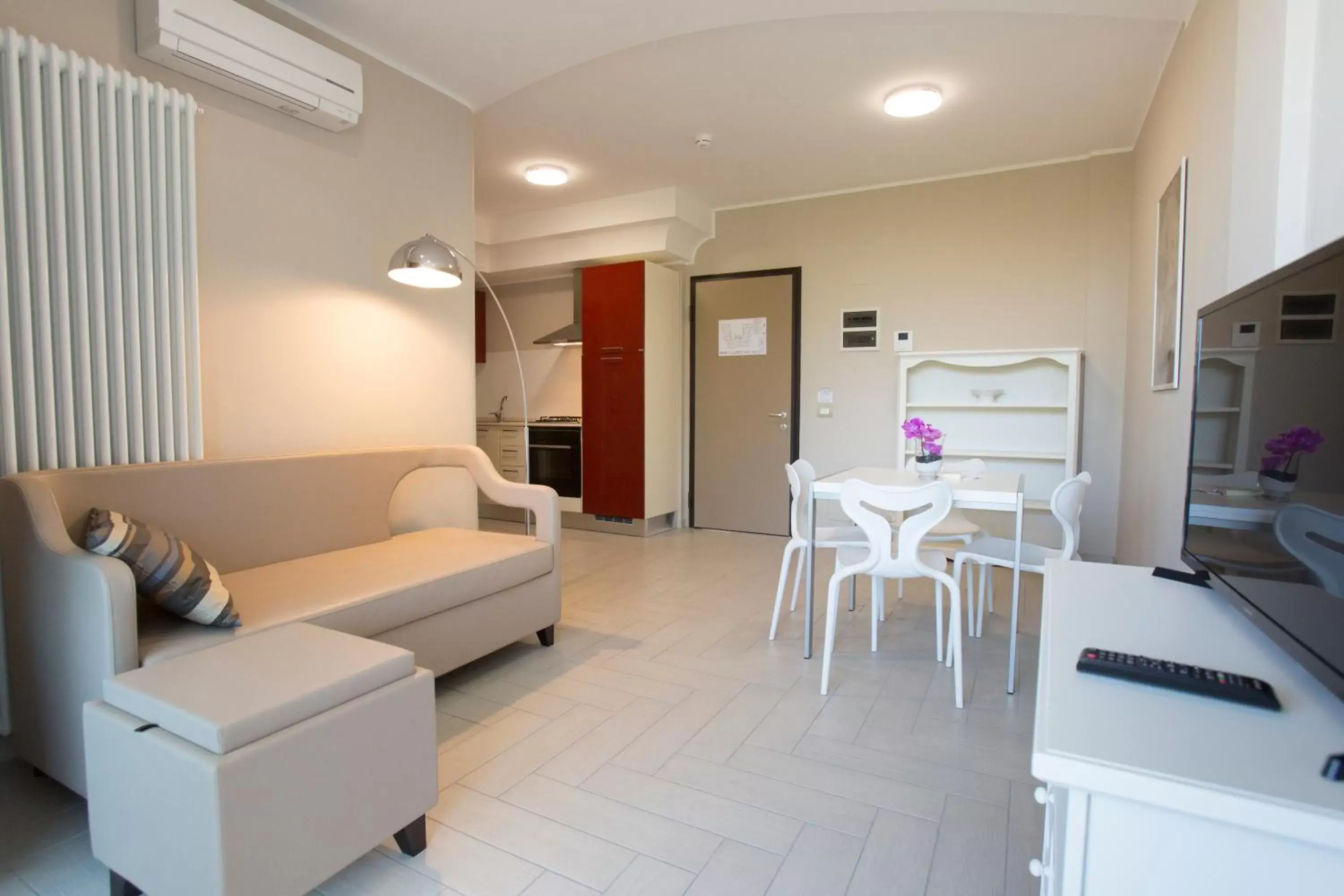 Kitchen or kitchenette, Seating Area in Nero D'Avorio Aparthotel & SPA