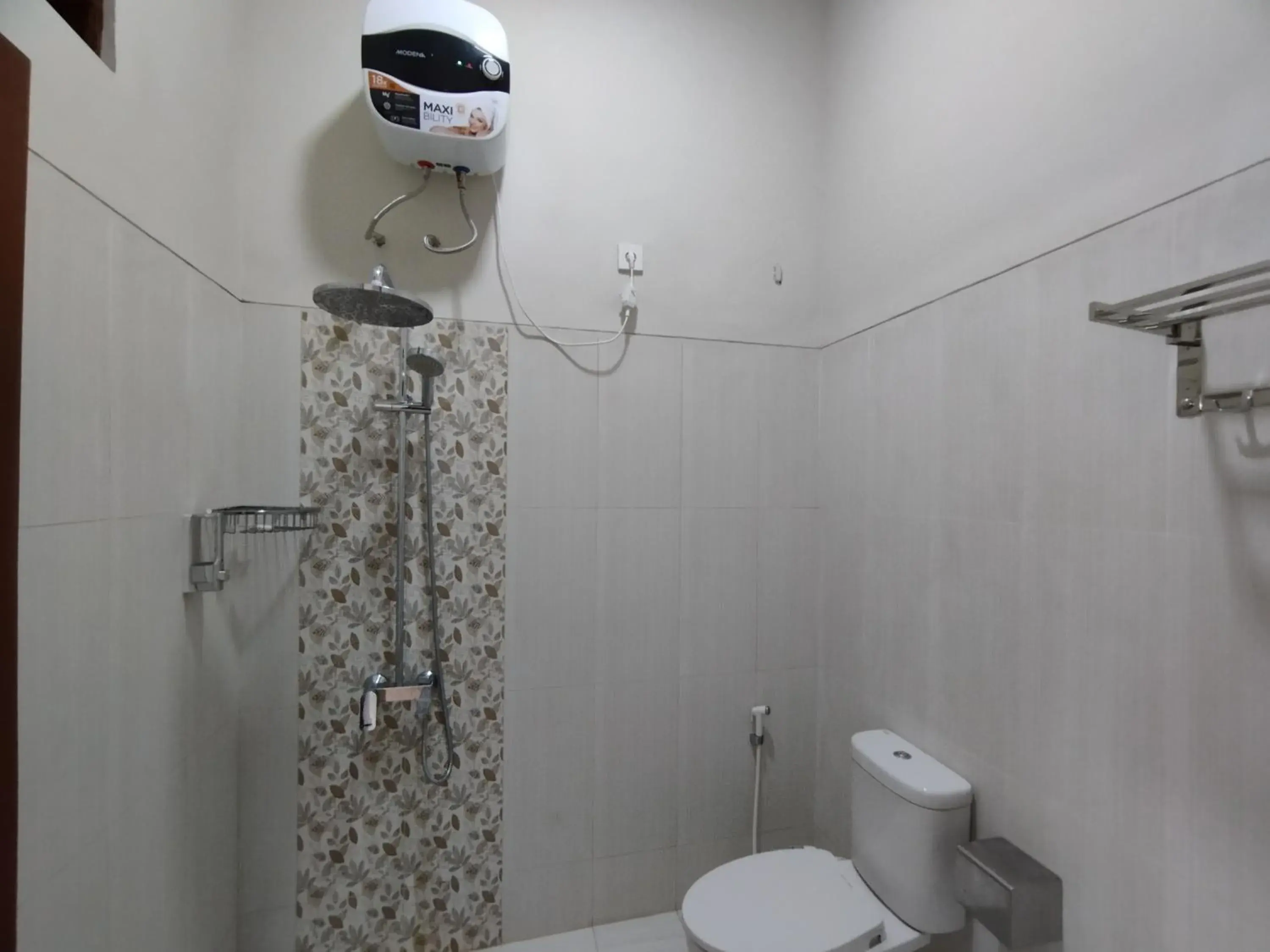 Bathroom in Saira Hotel dan Homestay Syariah