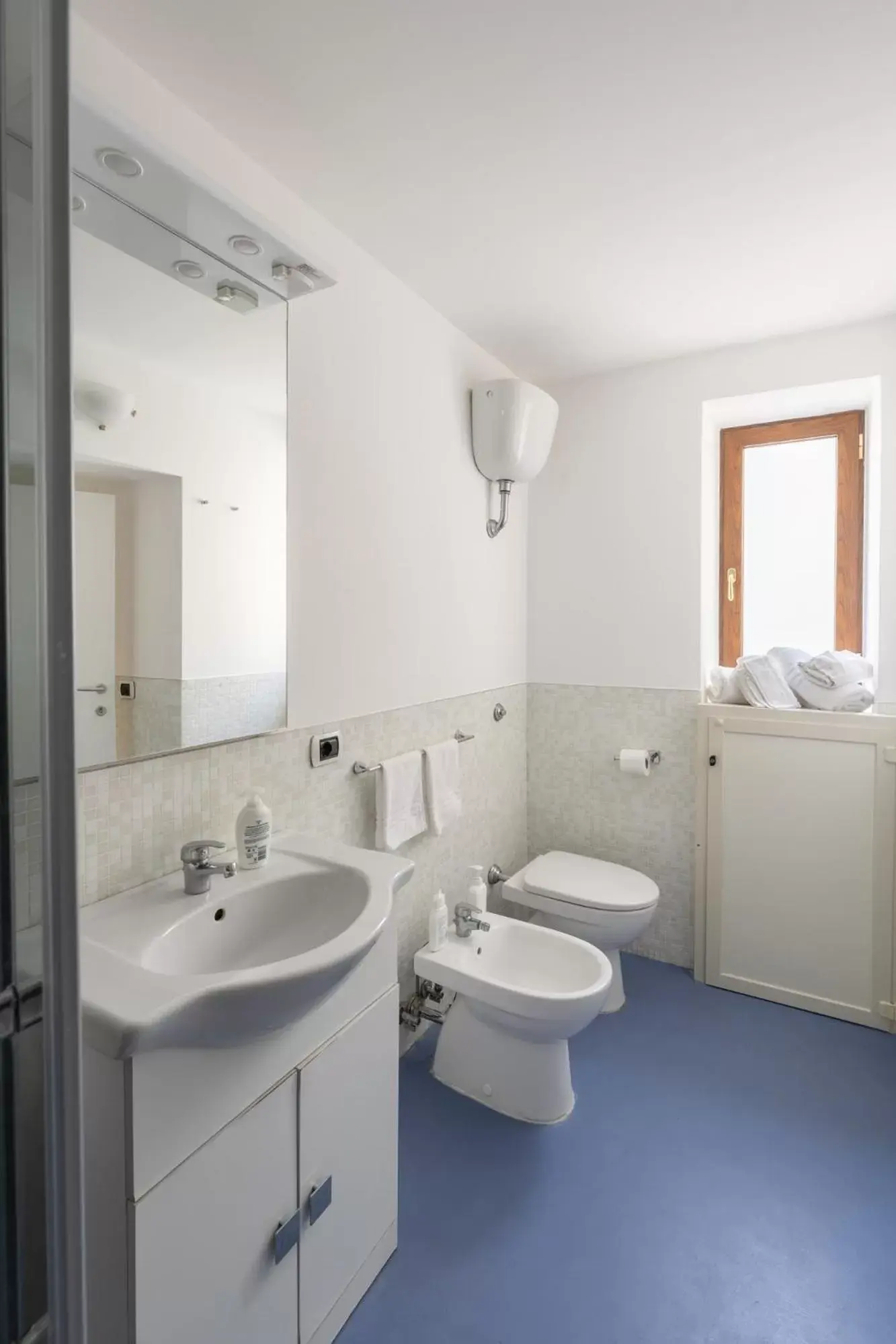 Toilet, Bathroom in The Charming Suites