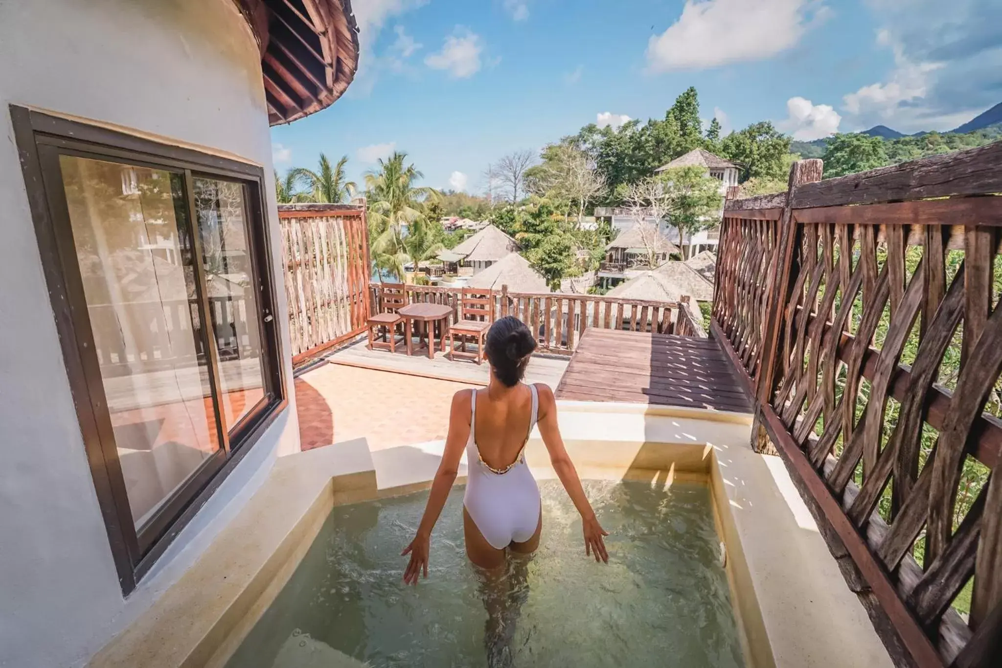 Balcony/Terrace, Swimming Pool in Aana Resort & Spa