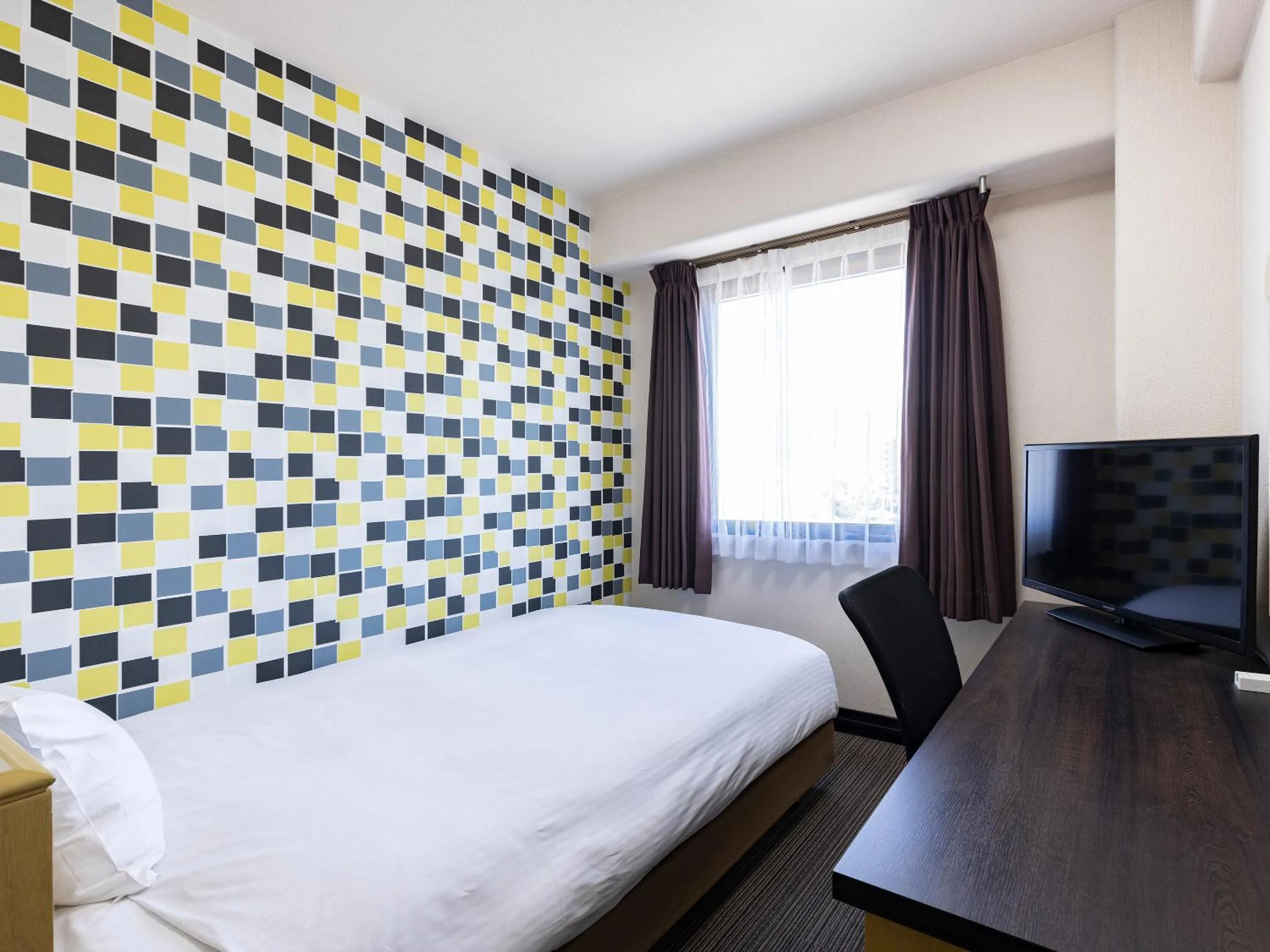 Bed in KOKO STAY Kumamoto Yatsushiro - formerly Hotel Wing International Kumamoto Yatsushiro