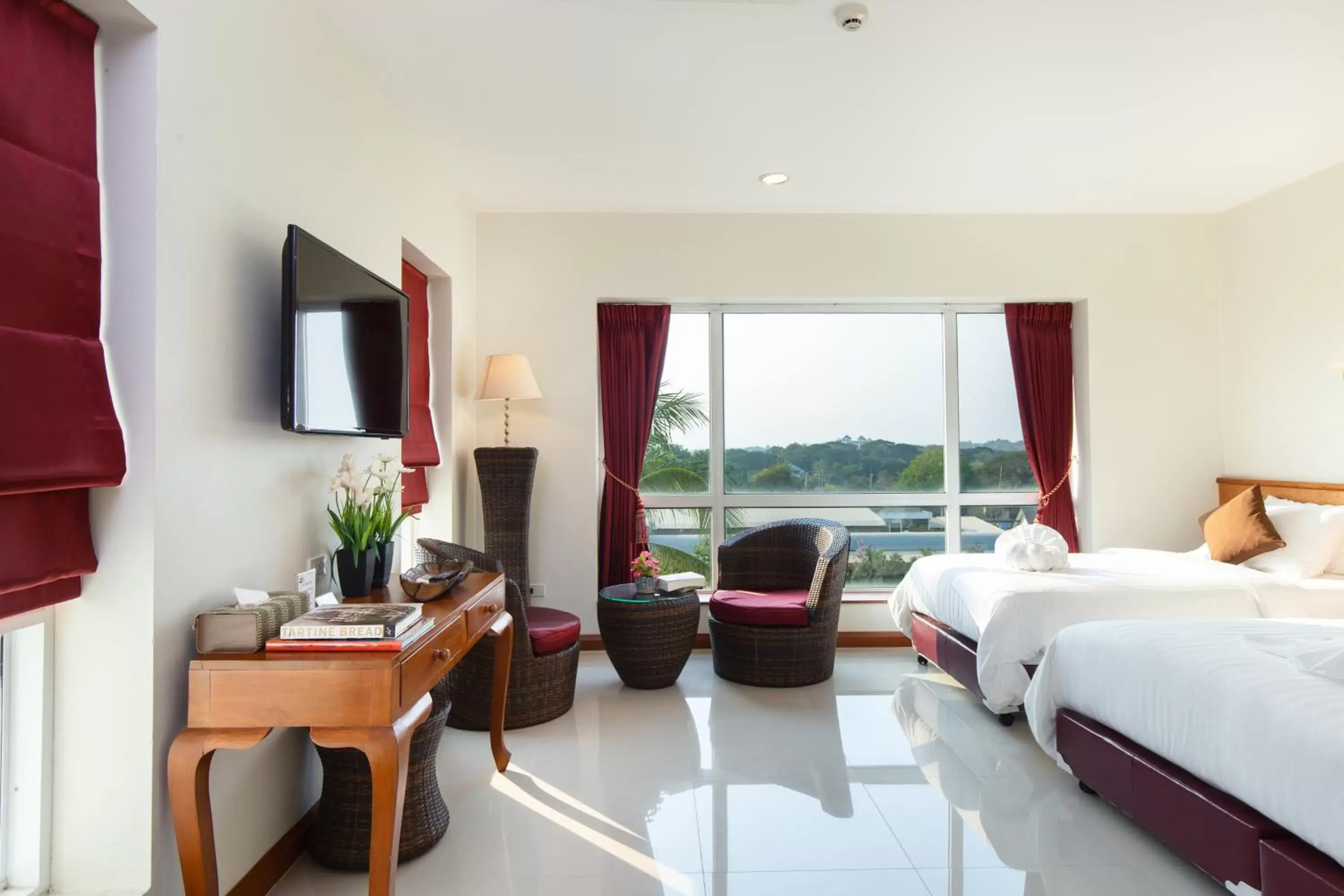 Bed in Kanchanaburi City Hotel - SHA Extra Plus