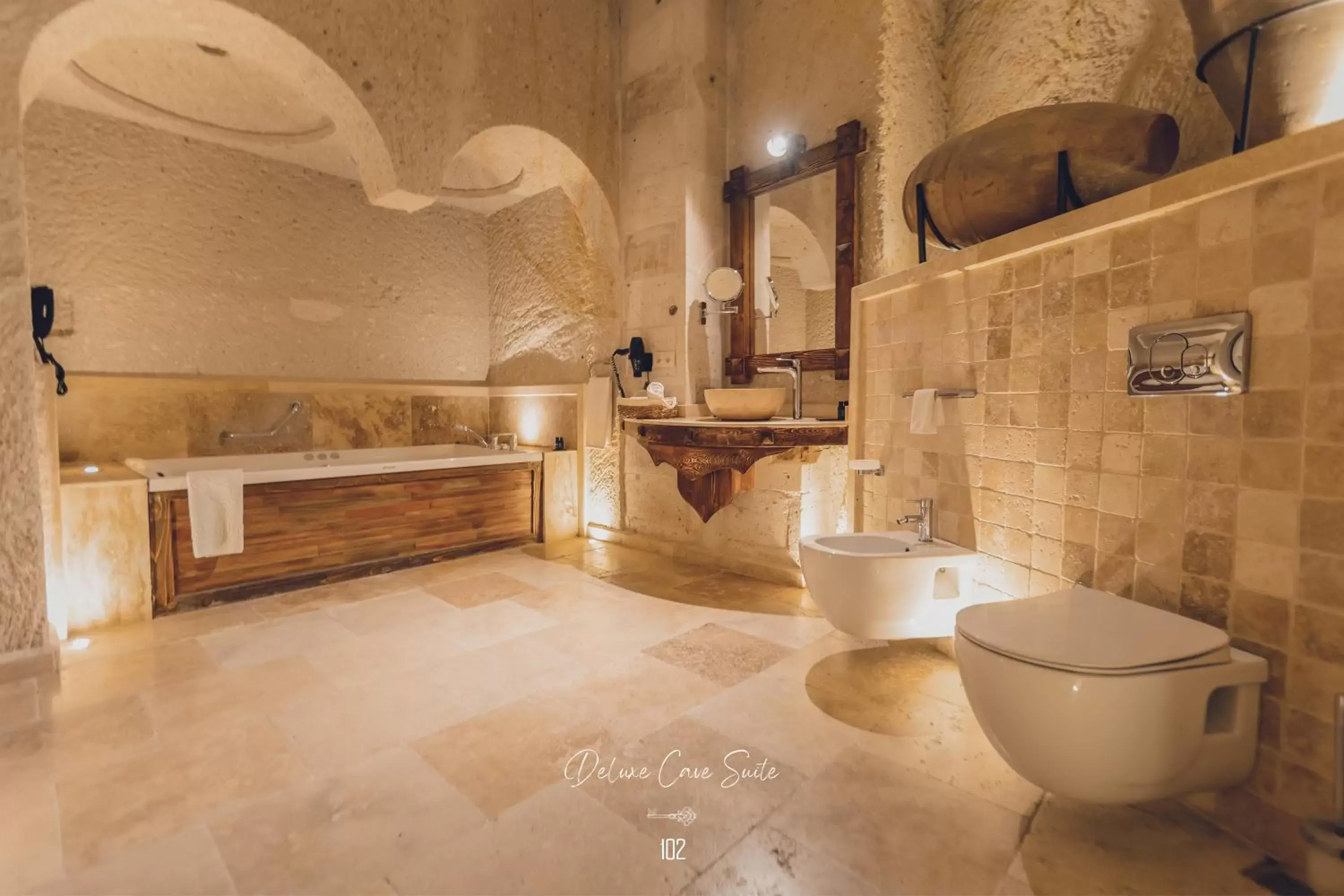 Toilet, Bathroom in Nino Cave Suites