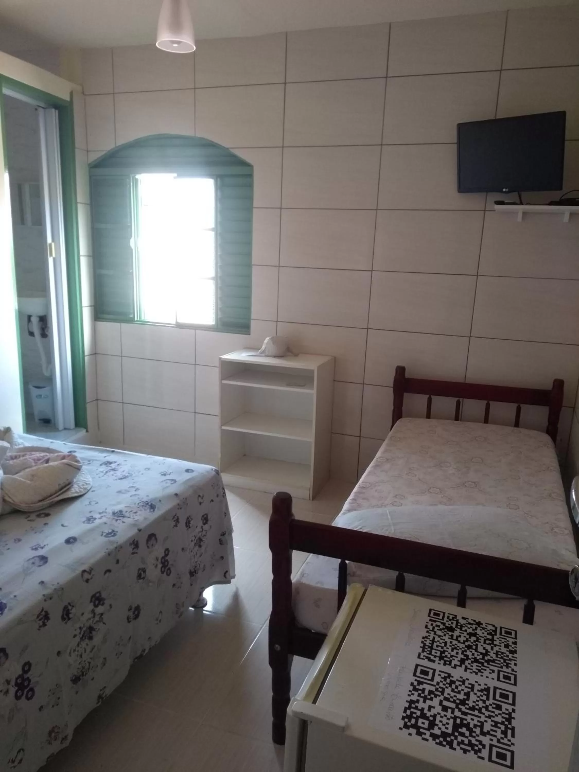 Property building, Bed in Pousada Encanto e Magia