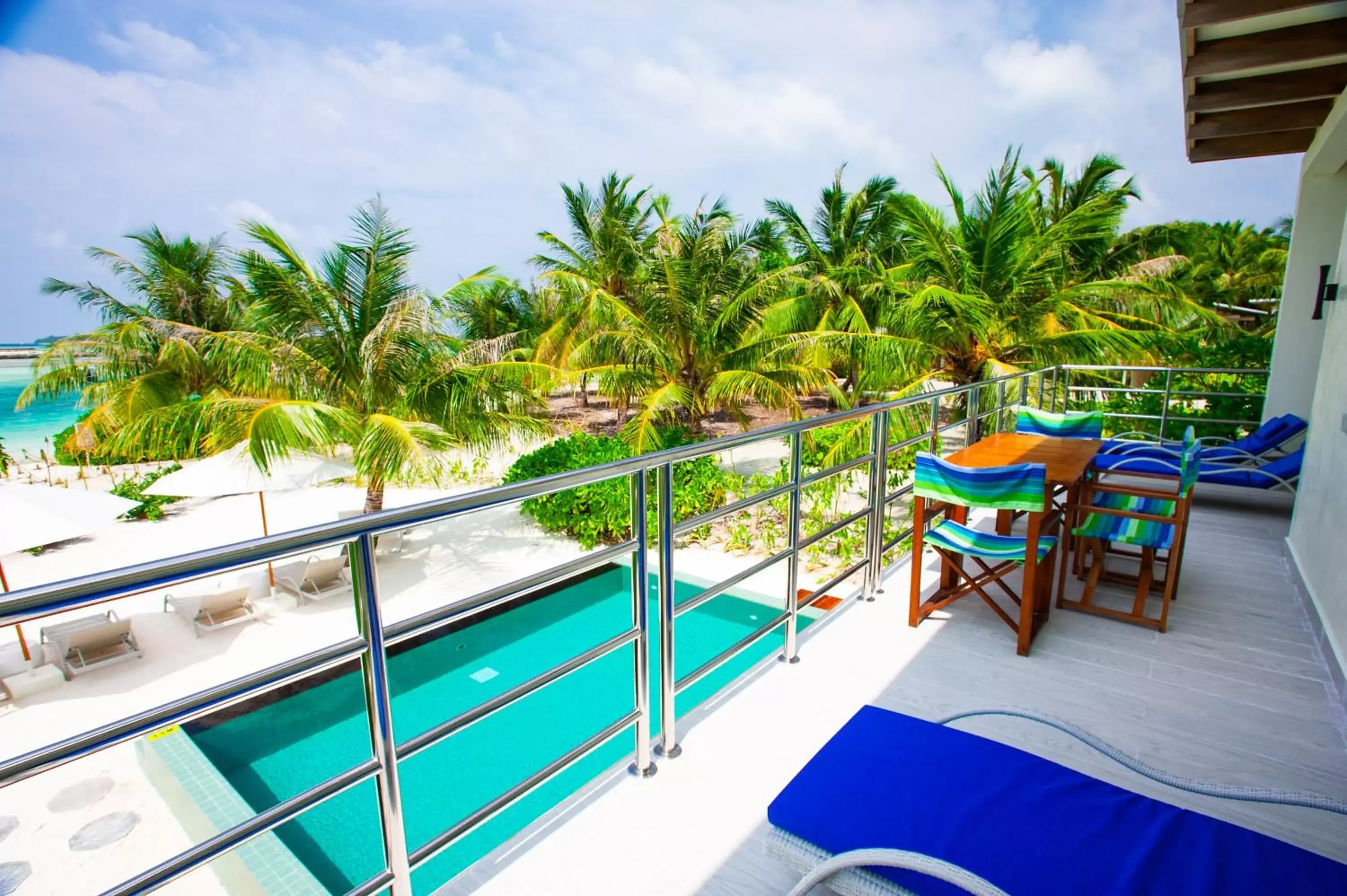 Balcony/Terrace, Pool View in Holiday Inn Resort Kandooma Maldives - Kids Stay & Eat Free