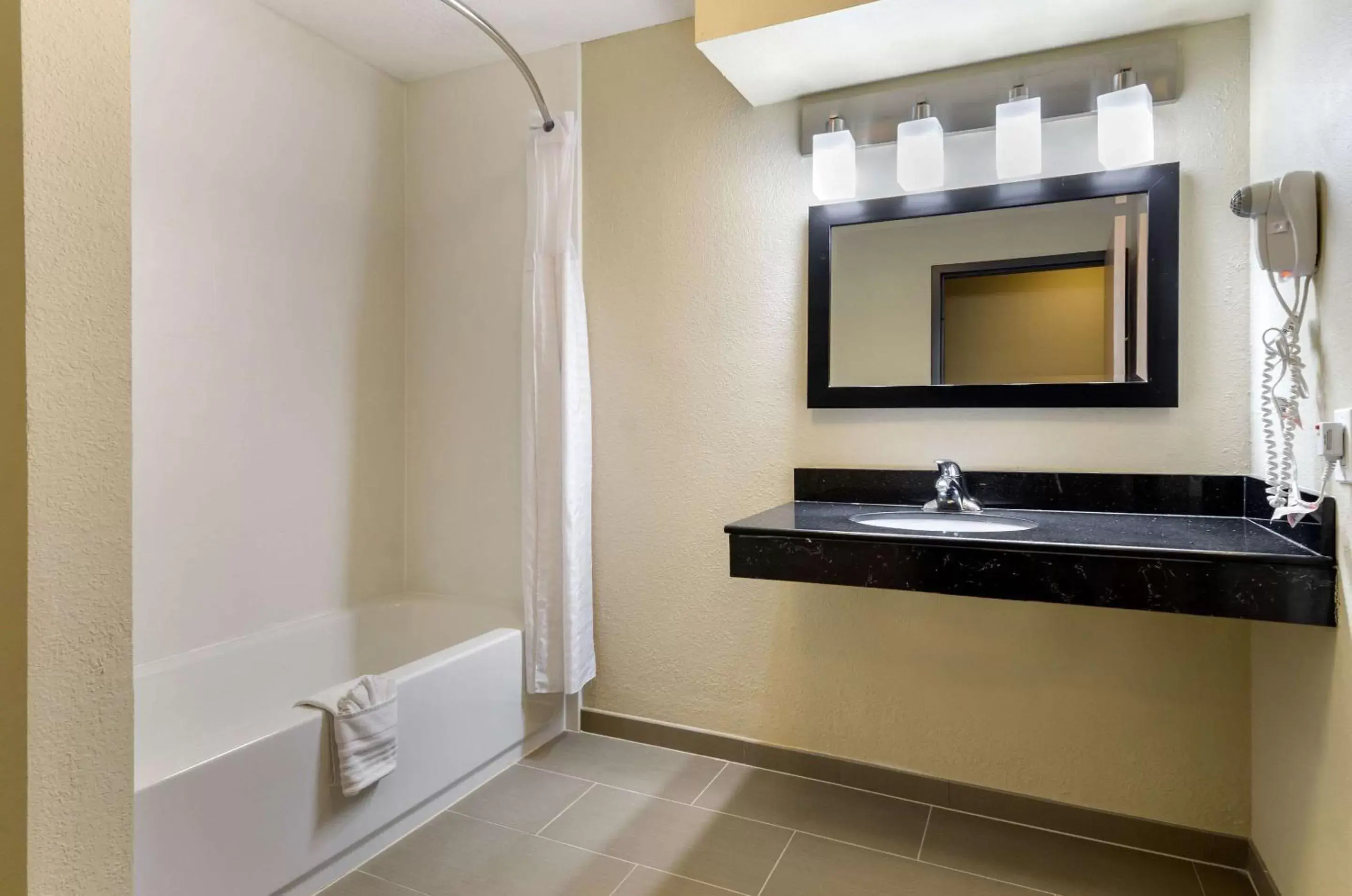 Bathroom in Comfort Inn & Suites Near Worlds of Fun