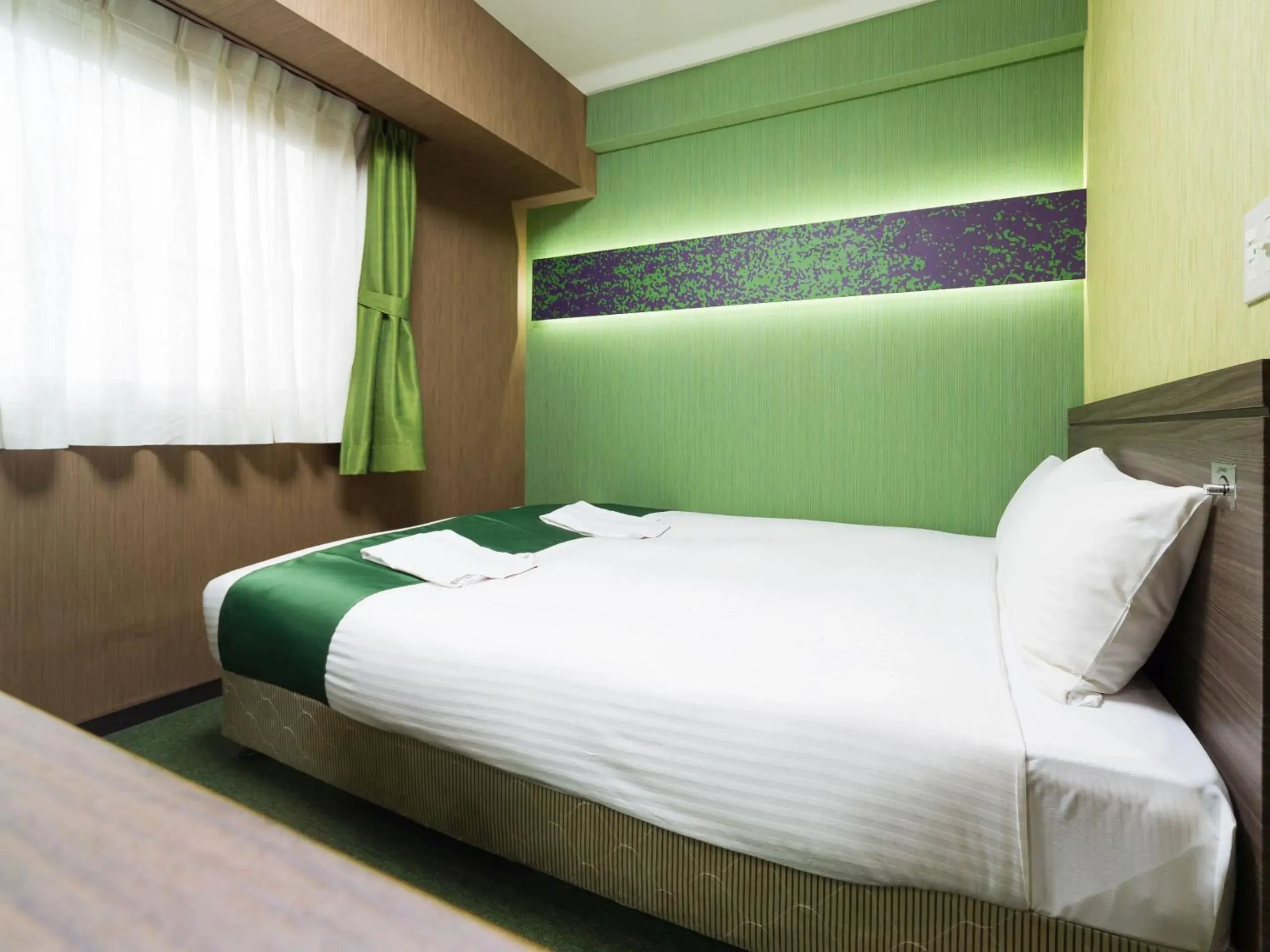 Bed in Hotel Wing International Nagoya