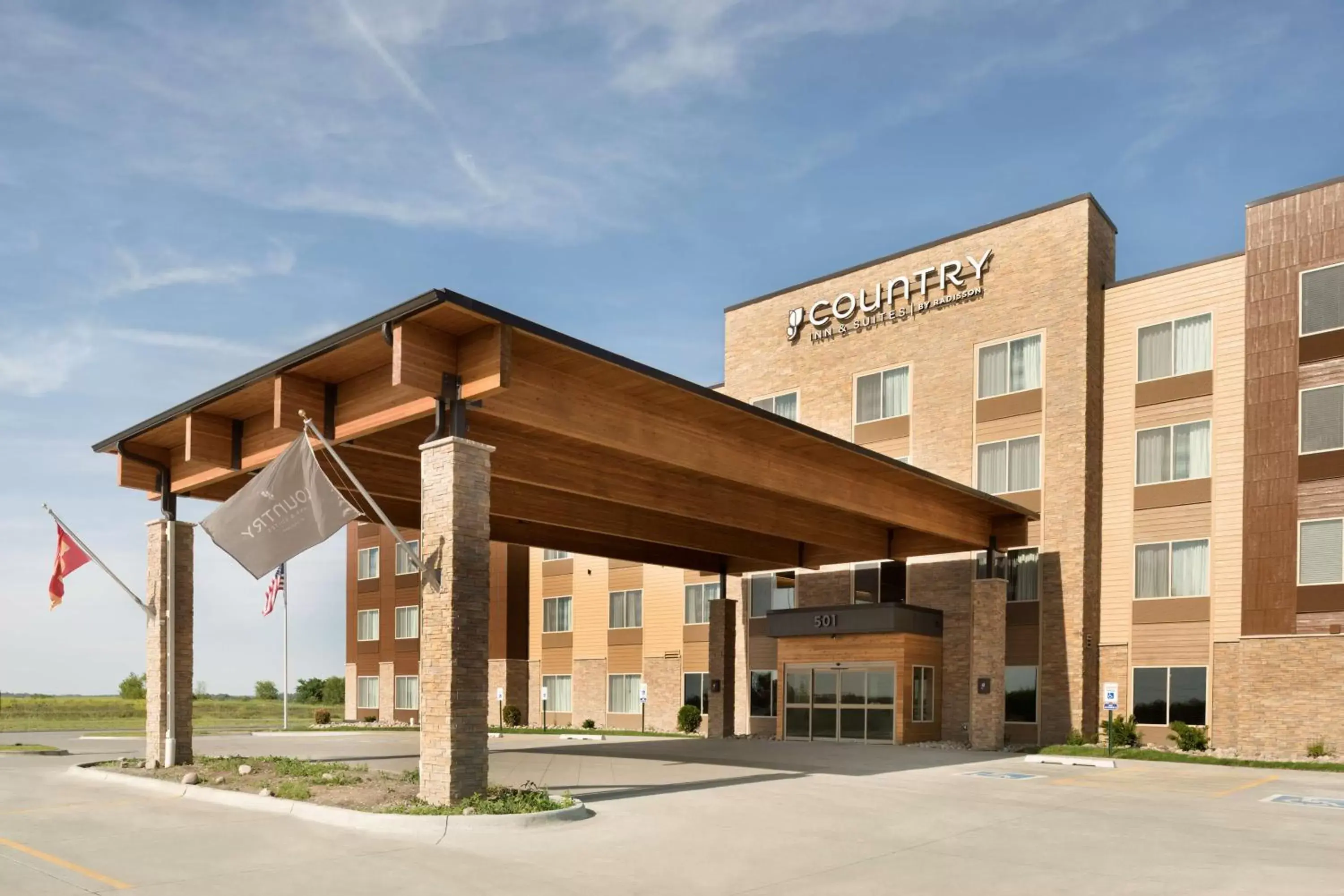 Property building in Country Inn & Suites by Radisson, Indianola, IA