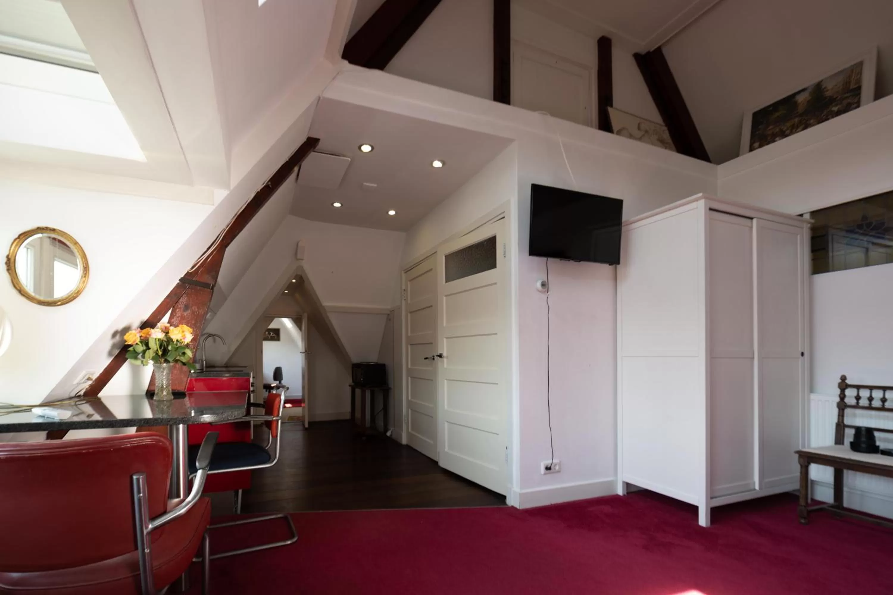 Dining area, TV/Entertainment Center in Xaviera's Bed and Breakfast