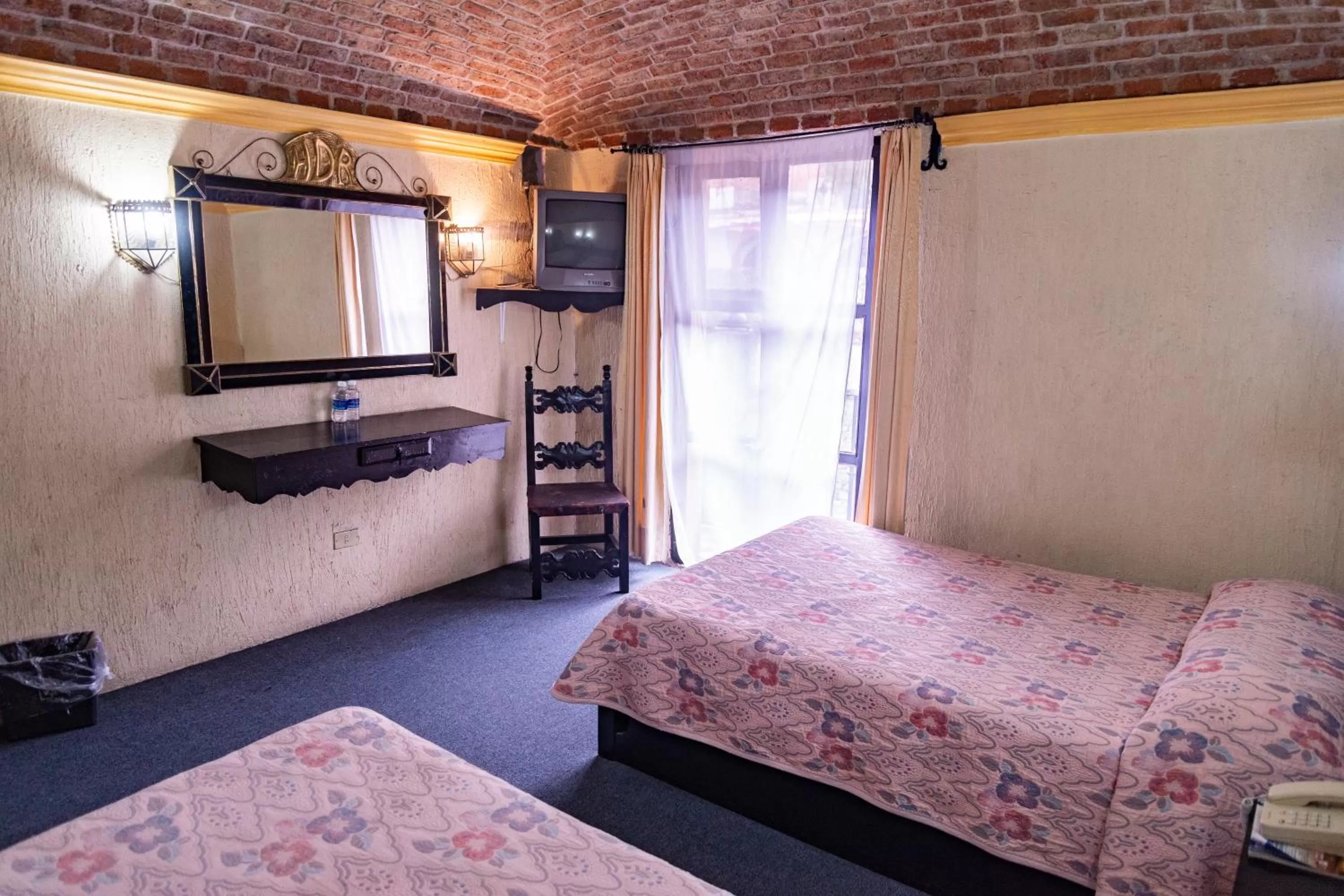 Bed in Hotel Hacienda de Cobos