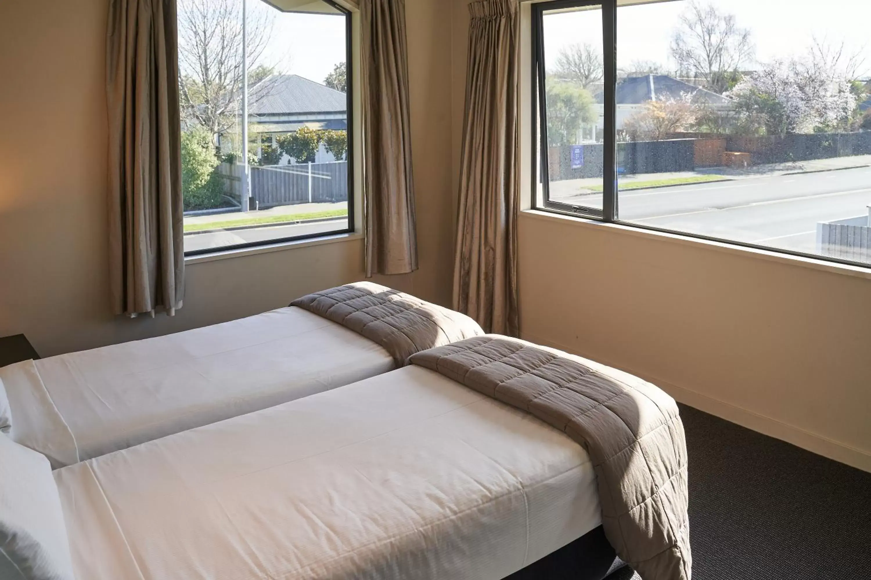 Bed in Azena Suites & Apartment