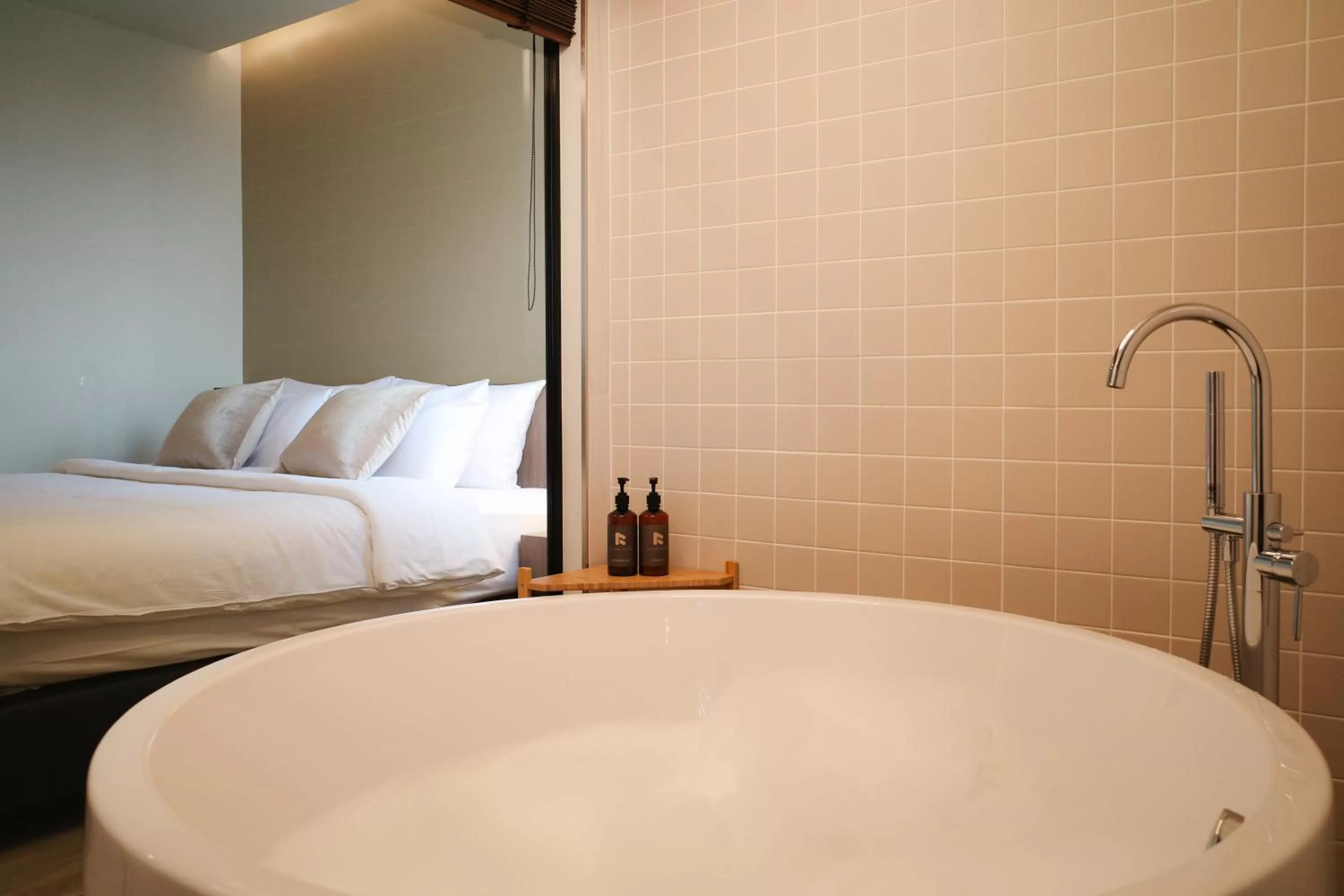 Bathroom, Bed in The Rise Suites Hotel, Chiang Mai - SHA Extra Plus