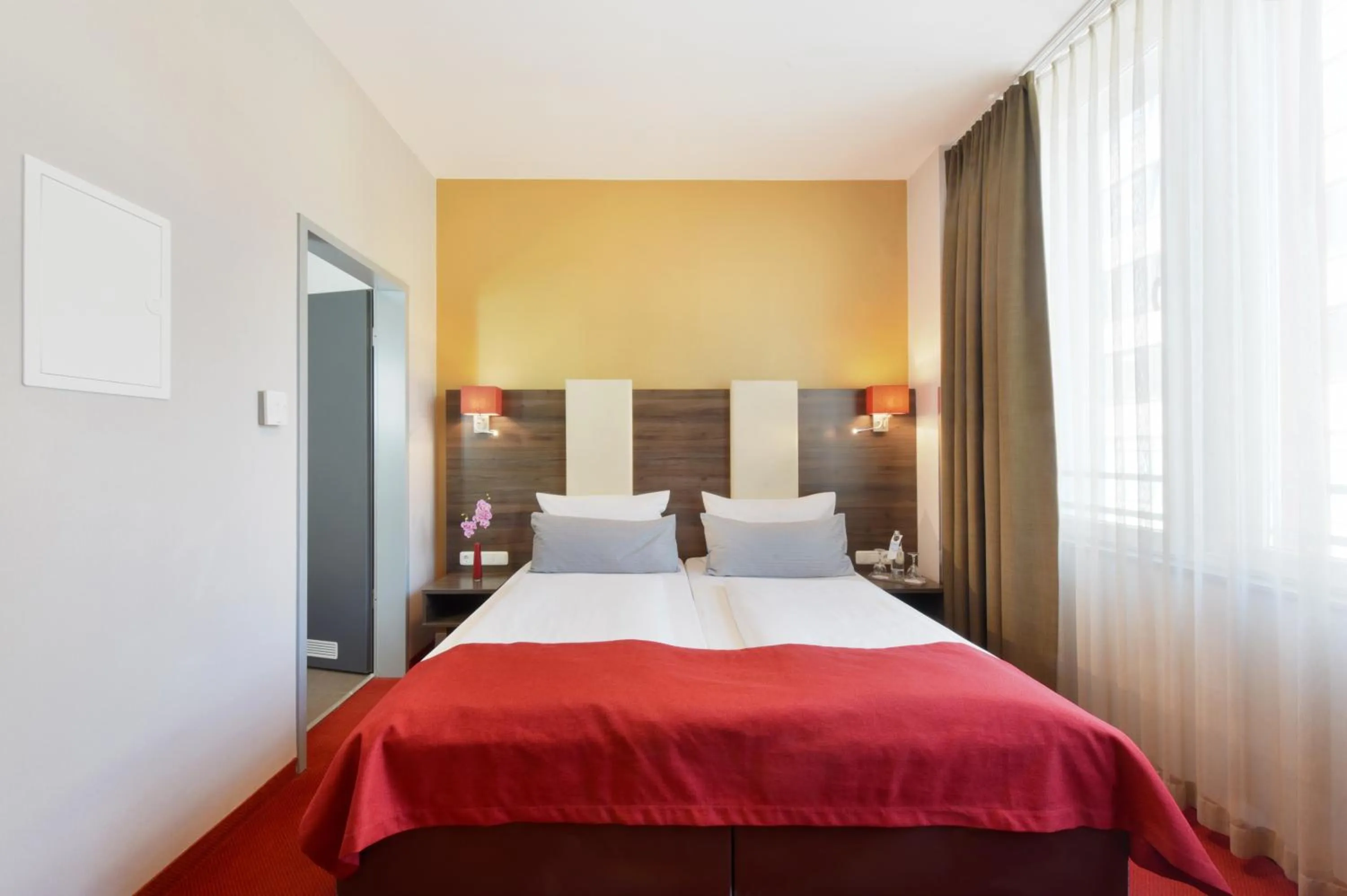 Photo of the whole room, Bed in KOOS Hotel&Apartments - City Aparthotel