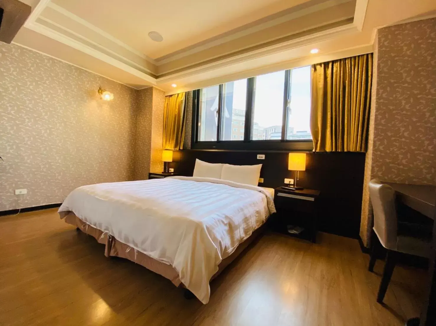 Bed in Herhuan Hotel