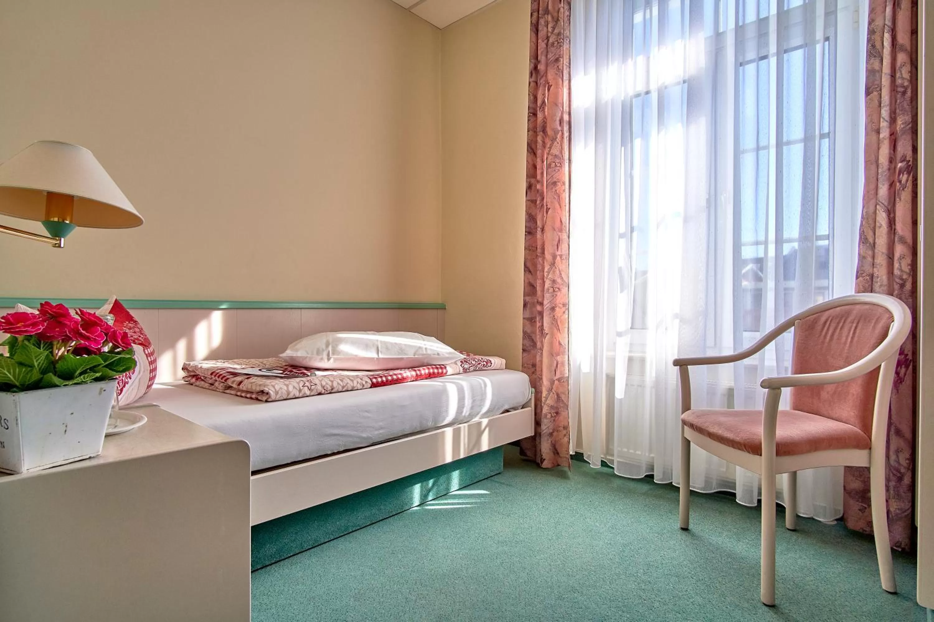 Photo of the whole room, Bed in Biohotel Amadeus