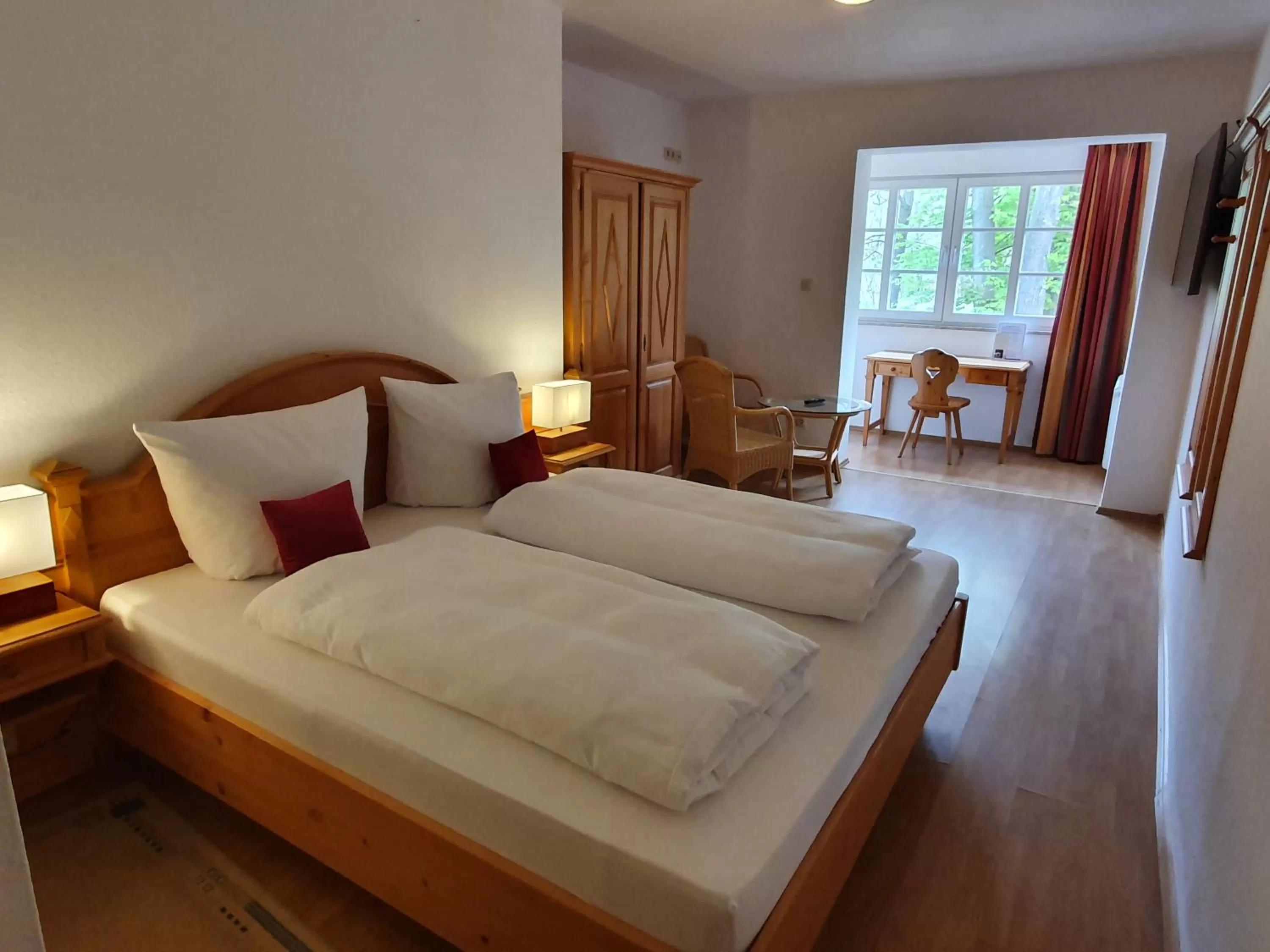 Photo of the whole room, Bed in Hotel und Weingut Karlsmühle