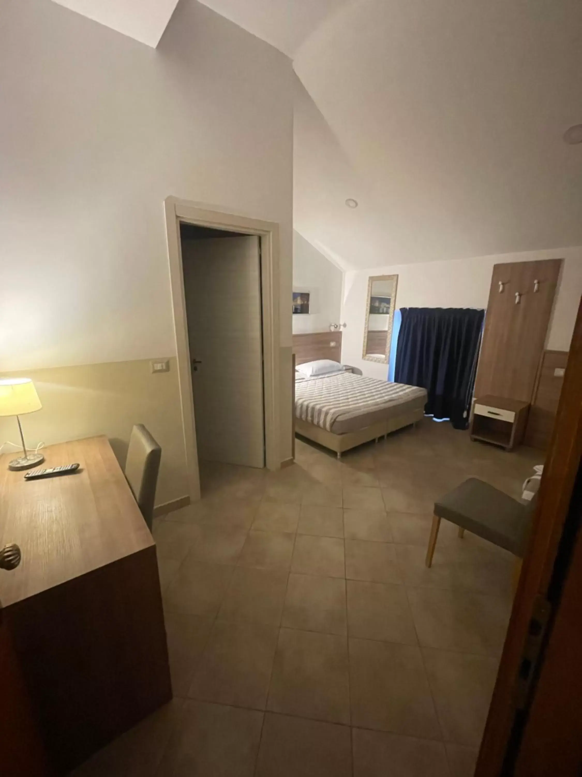 Classic Triple Room in Hotel Montecarlo Classic Triple Room in Hotel Montecarlo