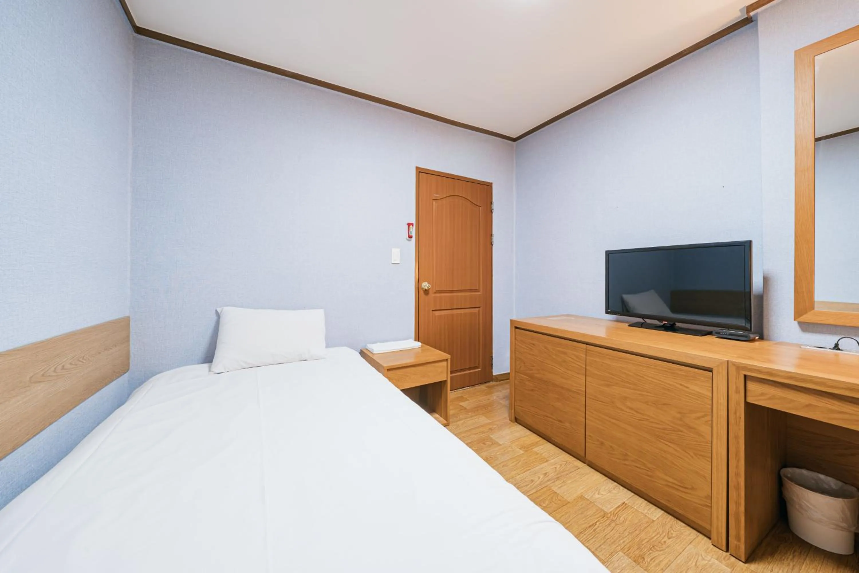 Bed in Jeju Miracle Hotel