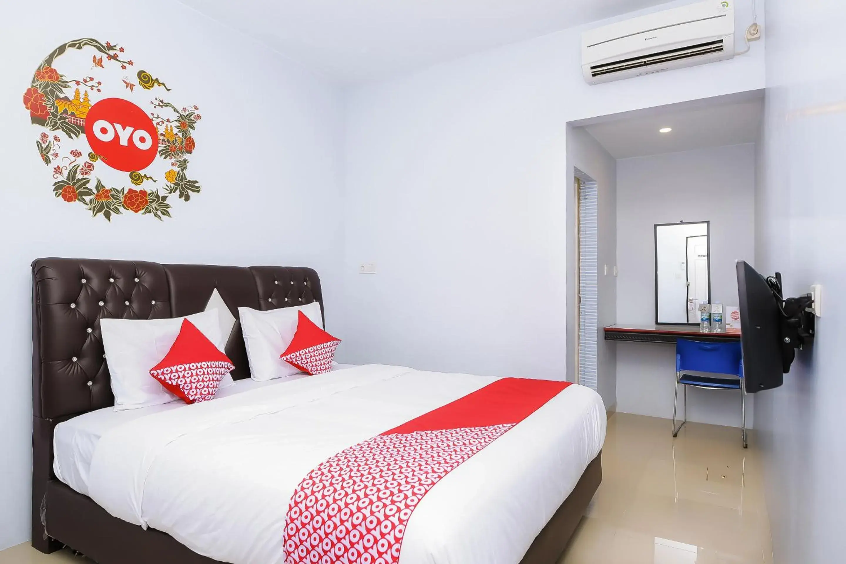 Bedroom in SUPER OYO 632 Hotel Mulana