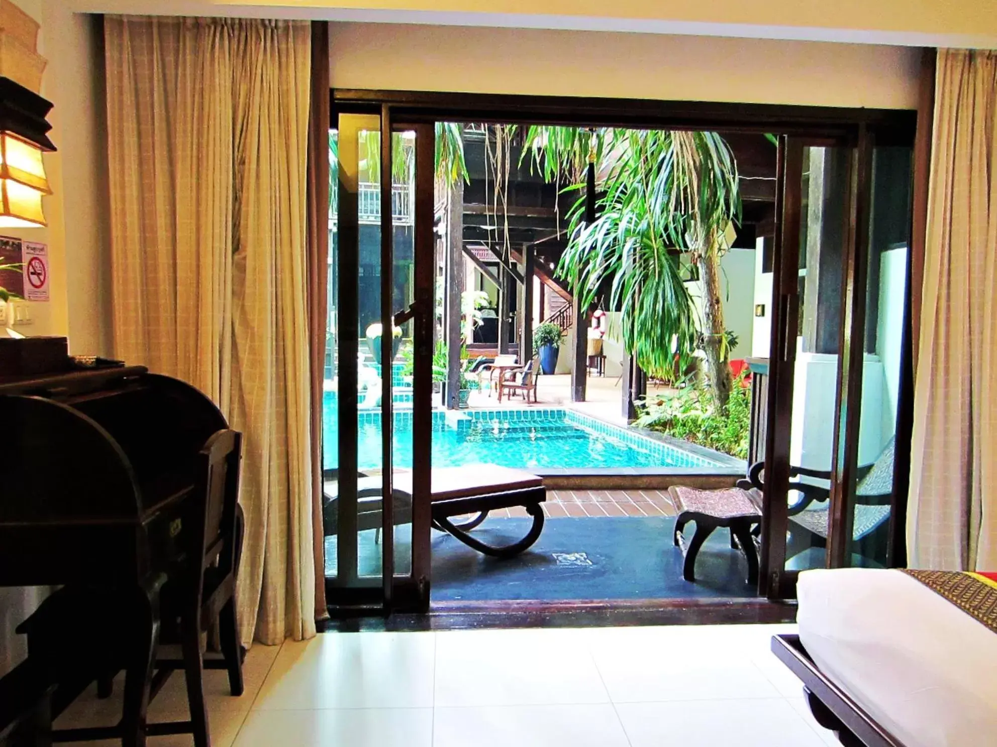 Balcony/Terrace, Pool View in Yantarasri Resort