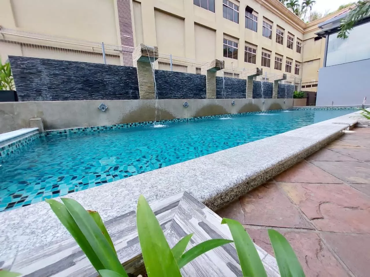 Swimming pool in CHRISTEE SUITES HOTEL