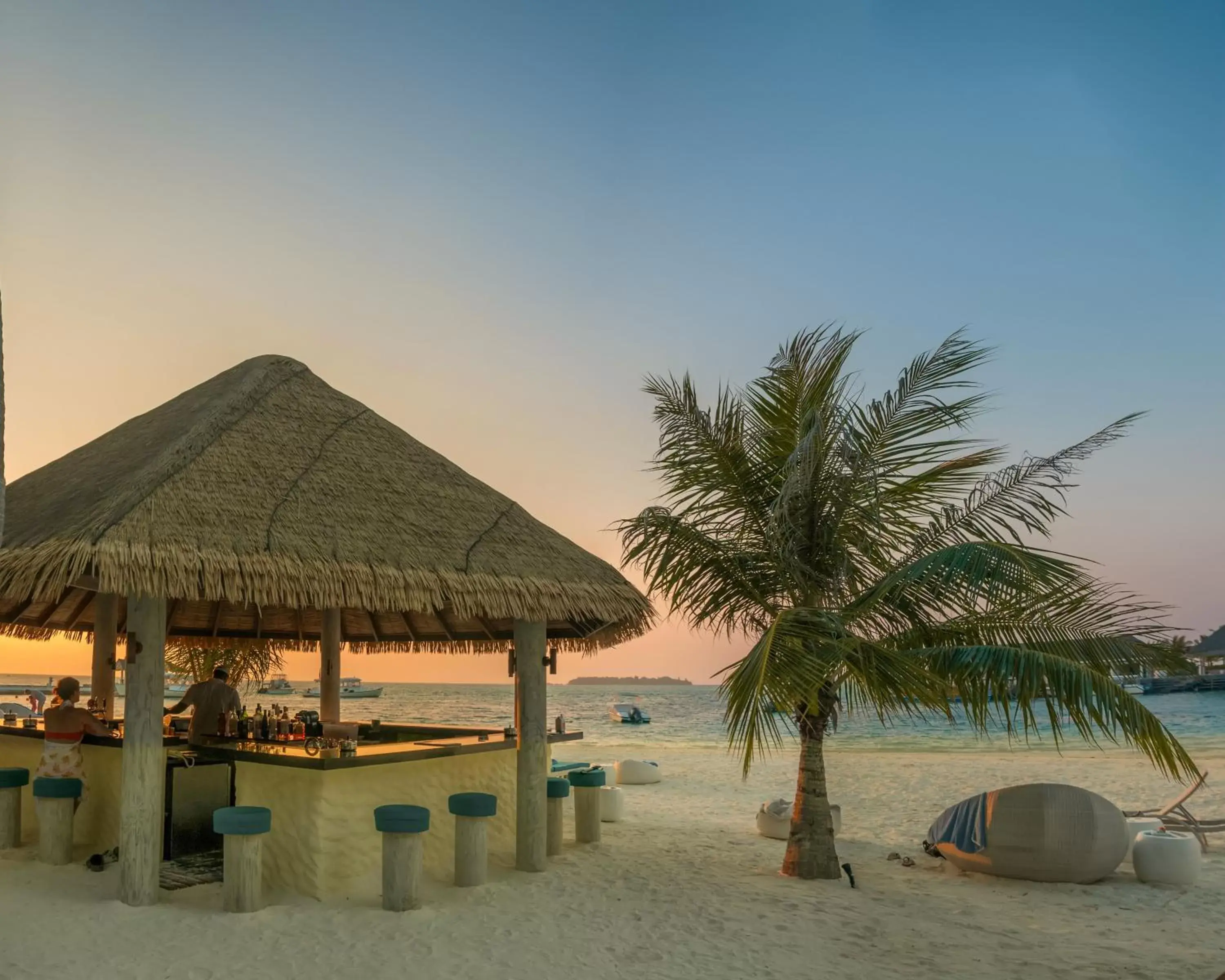 Lounge or bar, Beach in Holiday Inn Resort Kandooma Maldives - Kids Stay & Eat Free