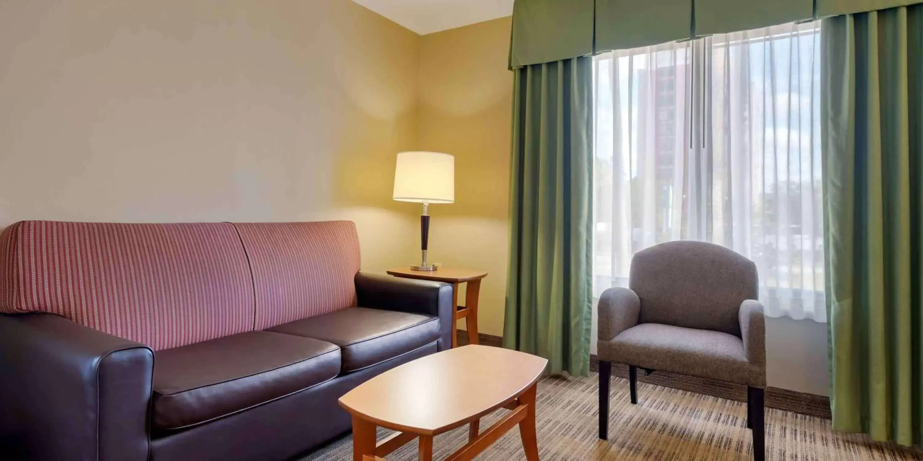 Bedroom, Seating Area in Extended Stay America Suites - Orlando - Orlando Theme Parks - Vineland Rd