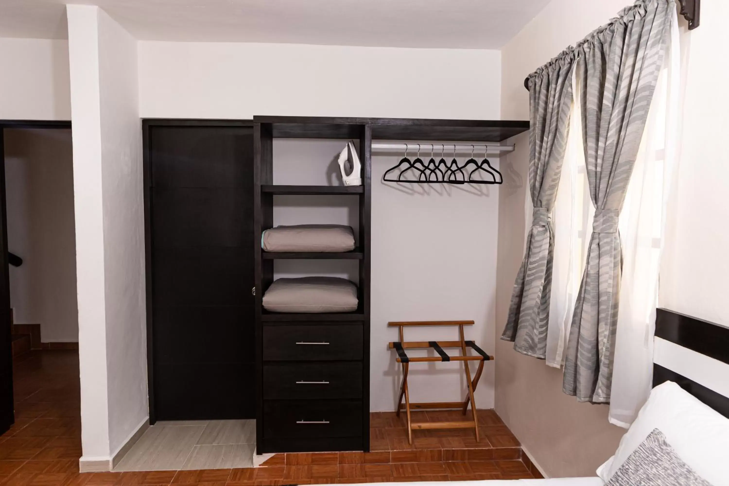 Bed in Santa Fe Studios And Suites